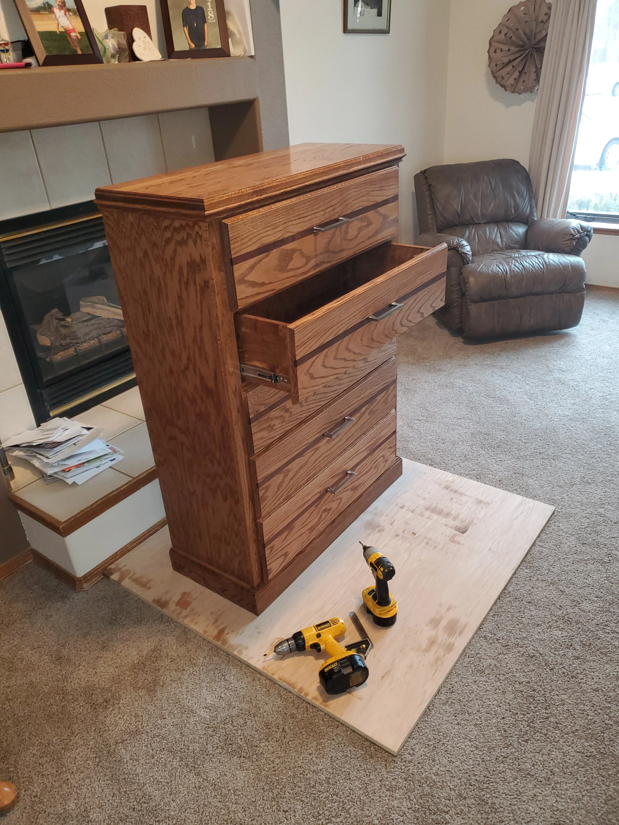 Oak dresser is being assembled 