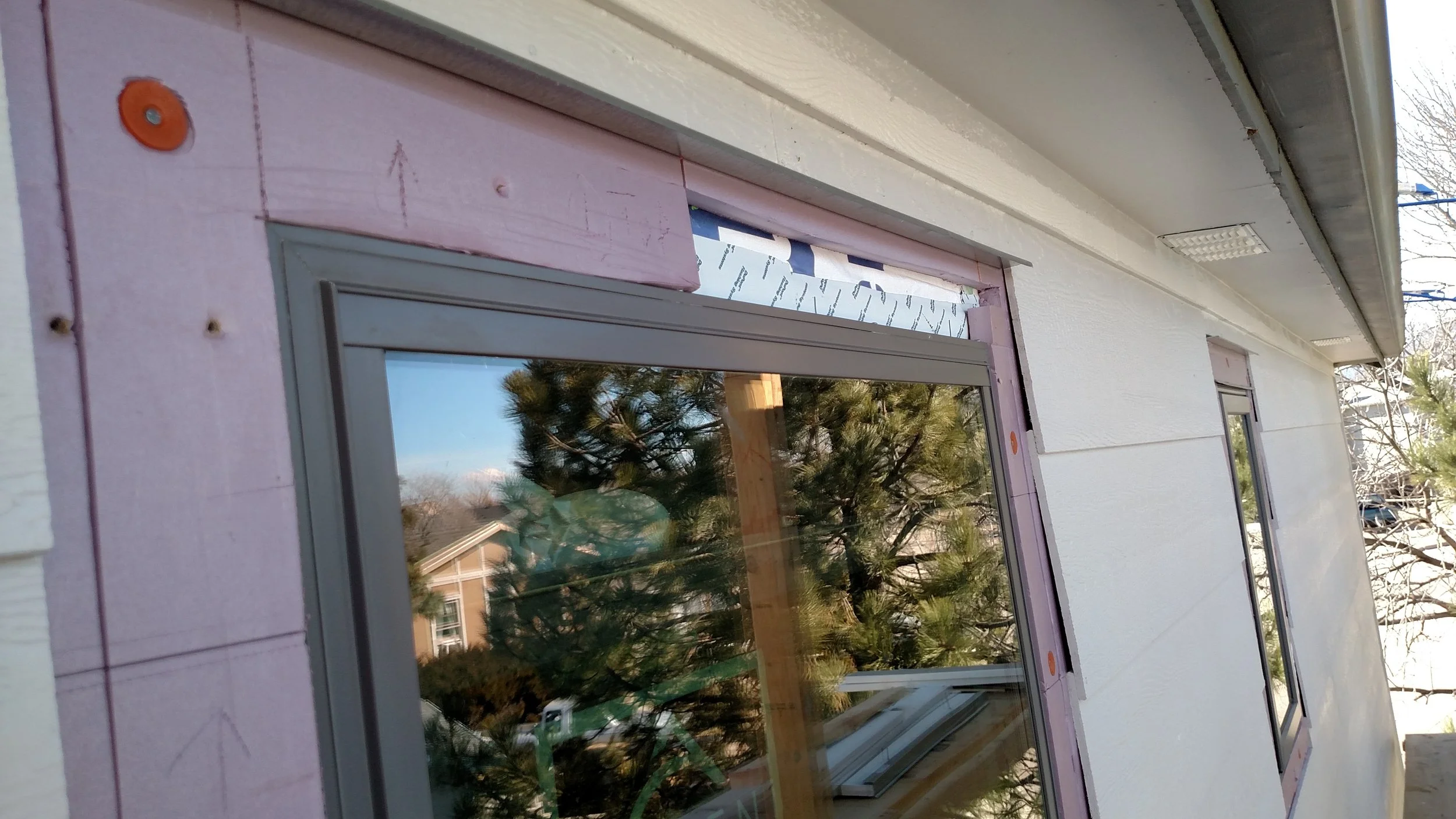 More XPS foam on the home's exterior before new siding.