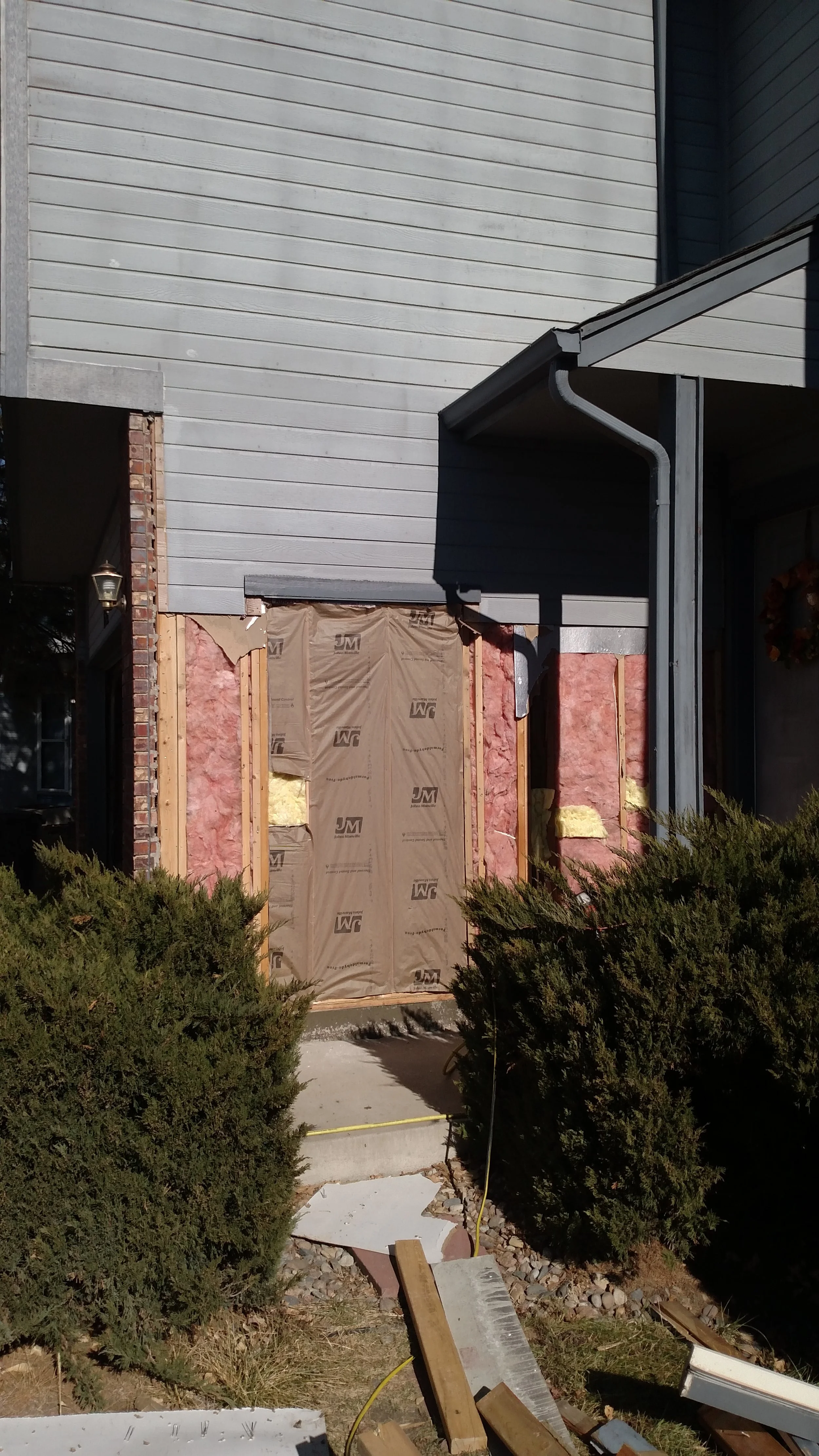 Deleteng doorway.  added insulation
