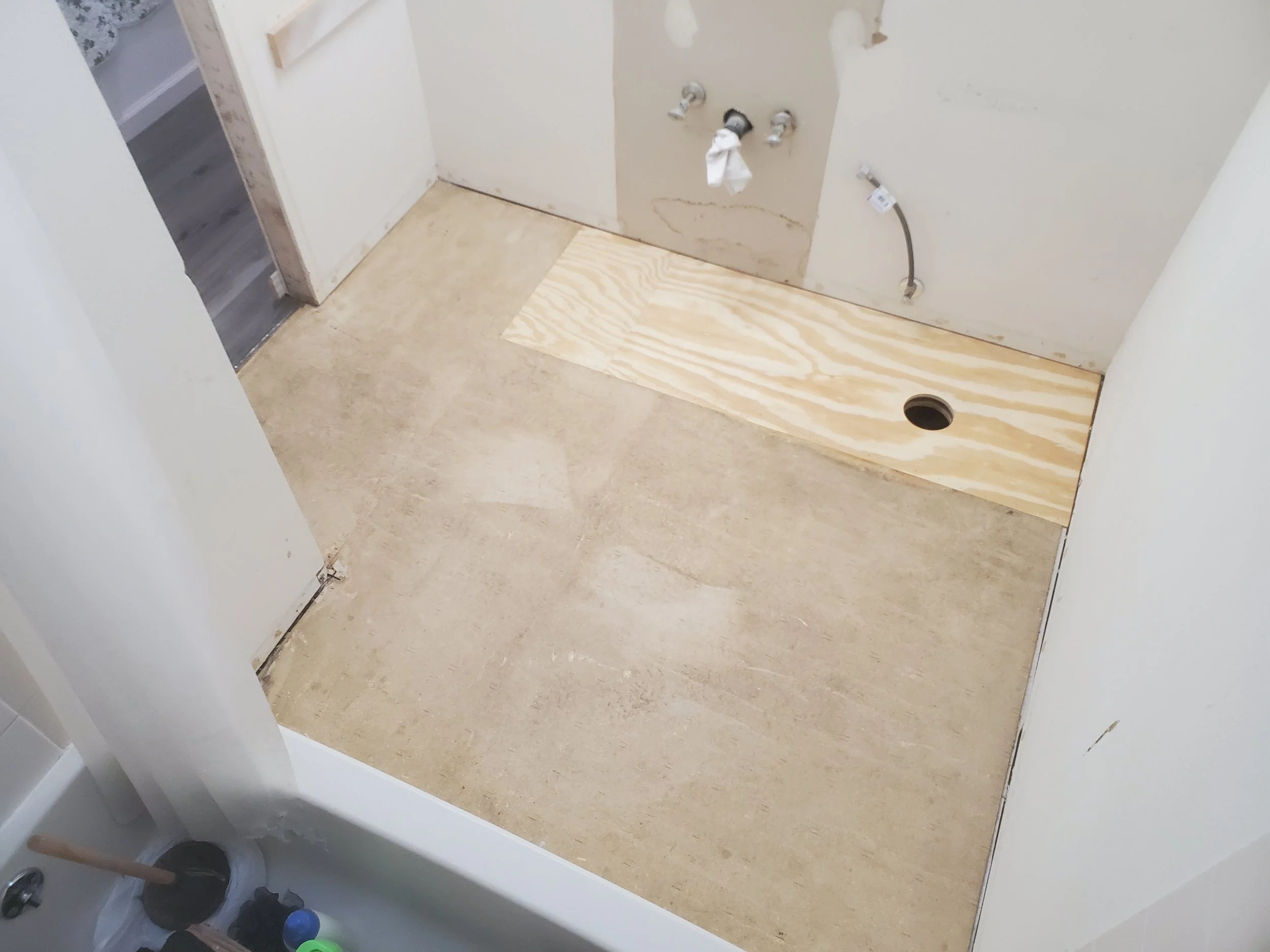 Water damaged bathroom floor repair 