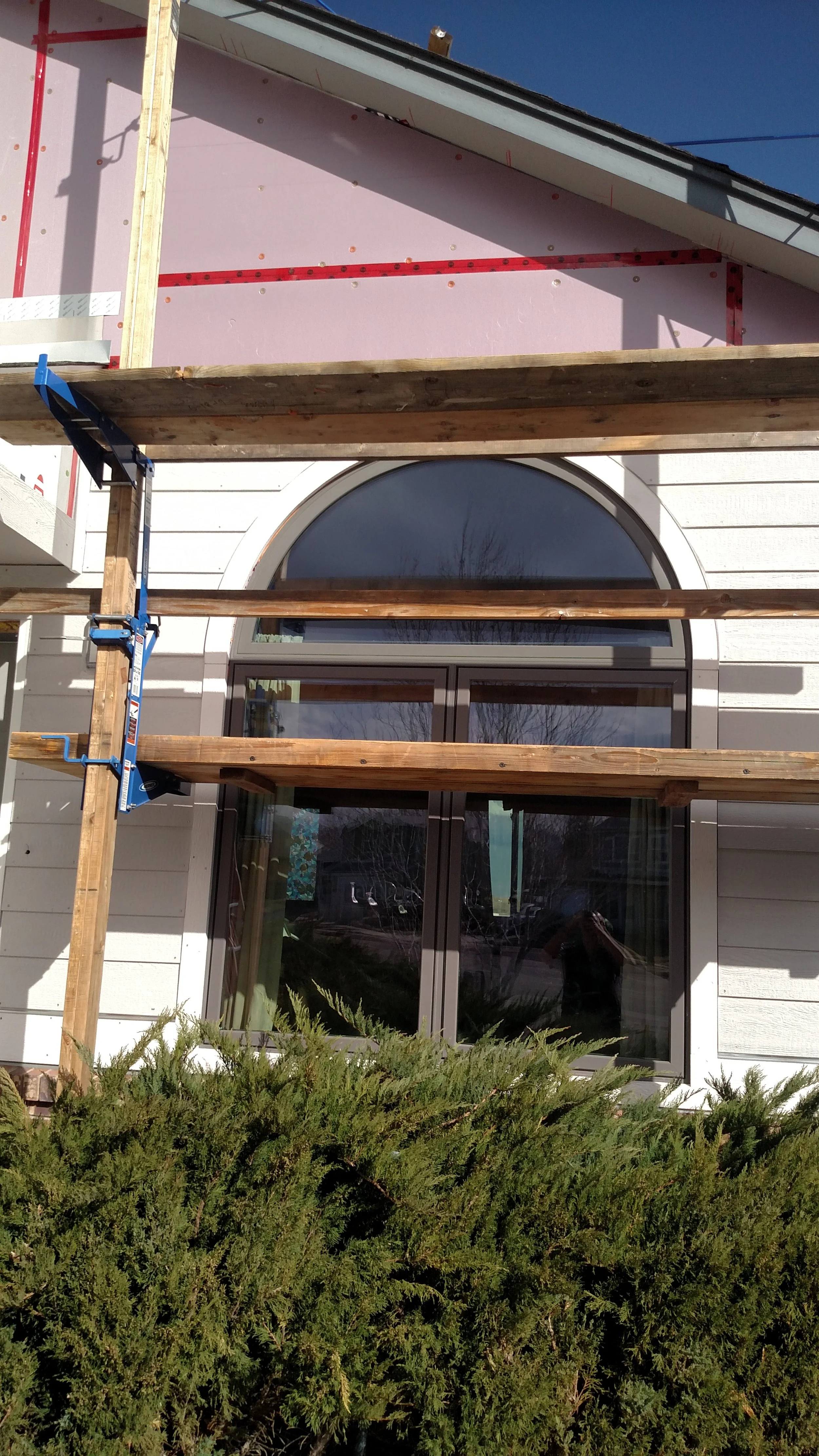 Adding Composite siding.