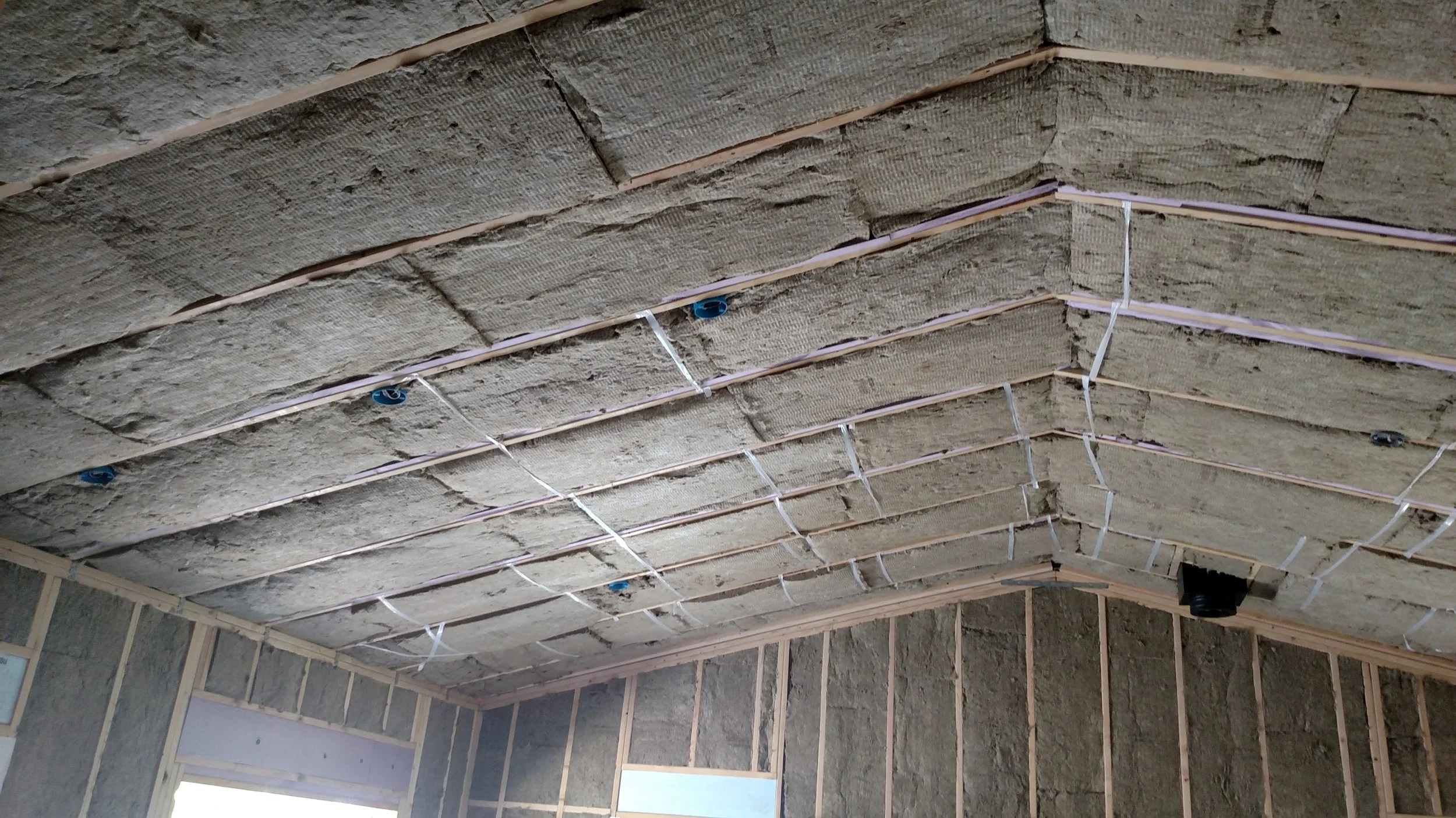 2 layers of R-30 Mineral wool.   Total ceiling insulation is R-60