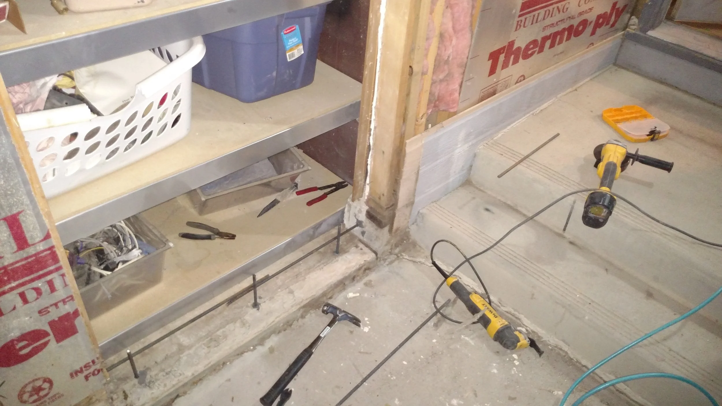 Adding rebar to footing to pour makeshift footer.  Deleting door way