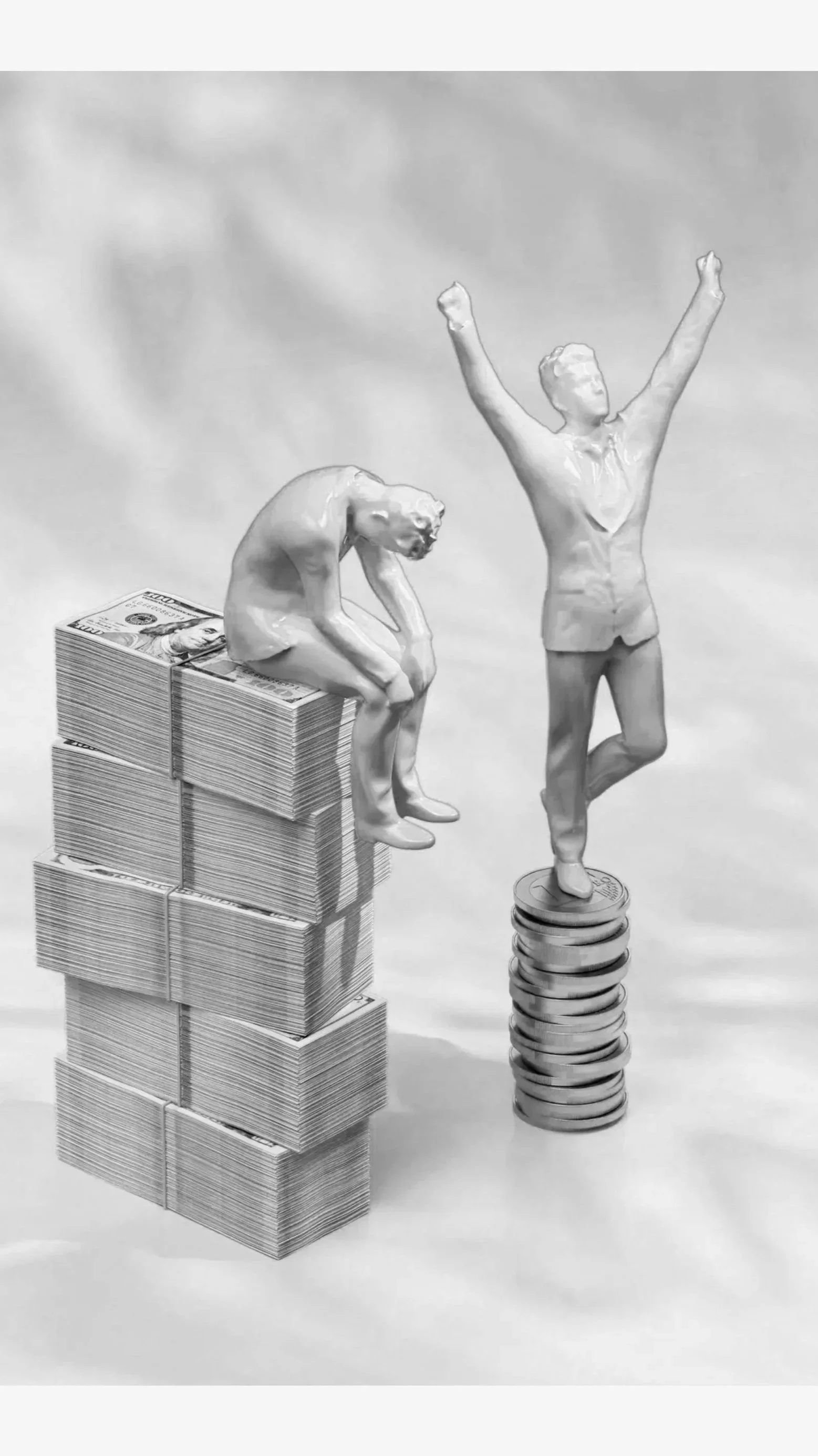 A sculpture of a woman sitting on a stack of cash and a sculpture of a man standing on a stack of coins, with both sculptures made of a glossy material.