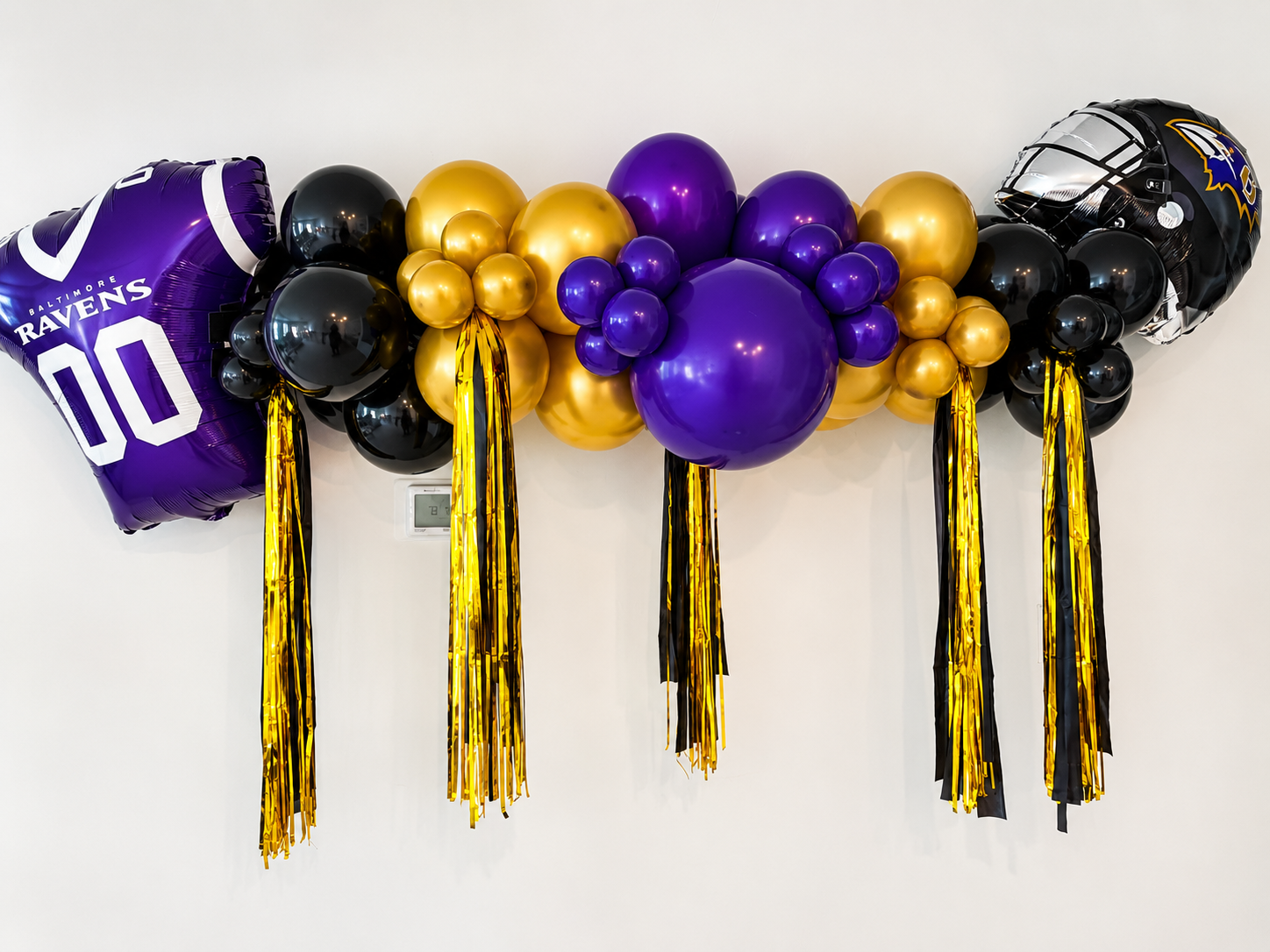 Ravens themed balloon garland 