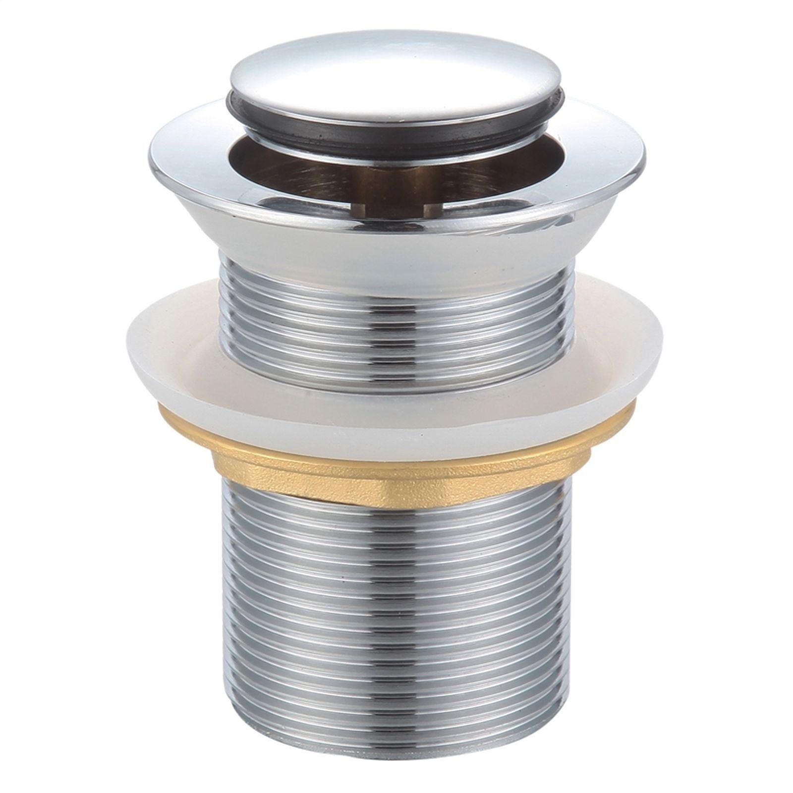 Close-up of a metal plumbing drain with a silver strainer and ridged pipe, showing sections with different metallic finishes and a brass ring near the middle. Formed Solid Surface