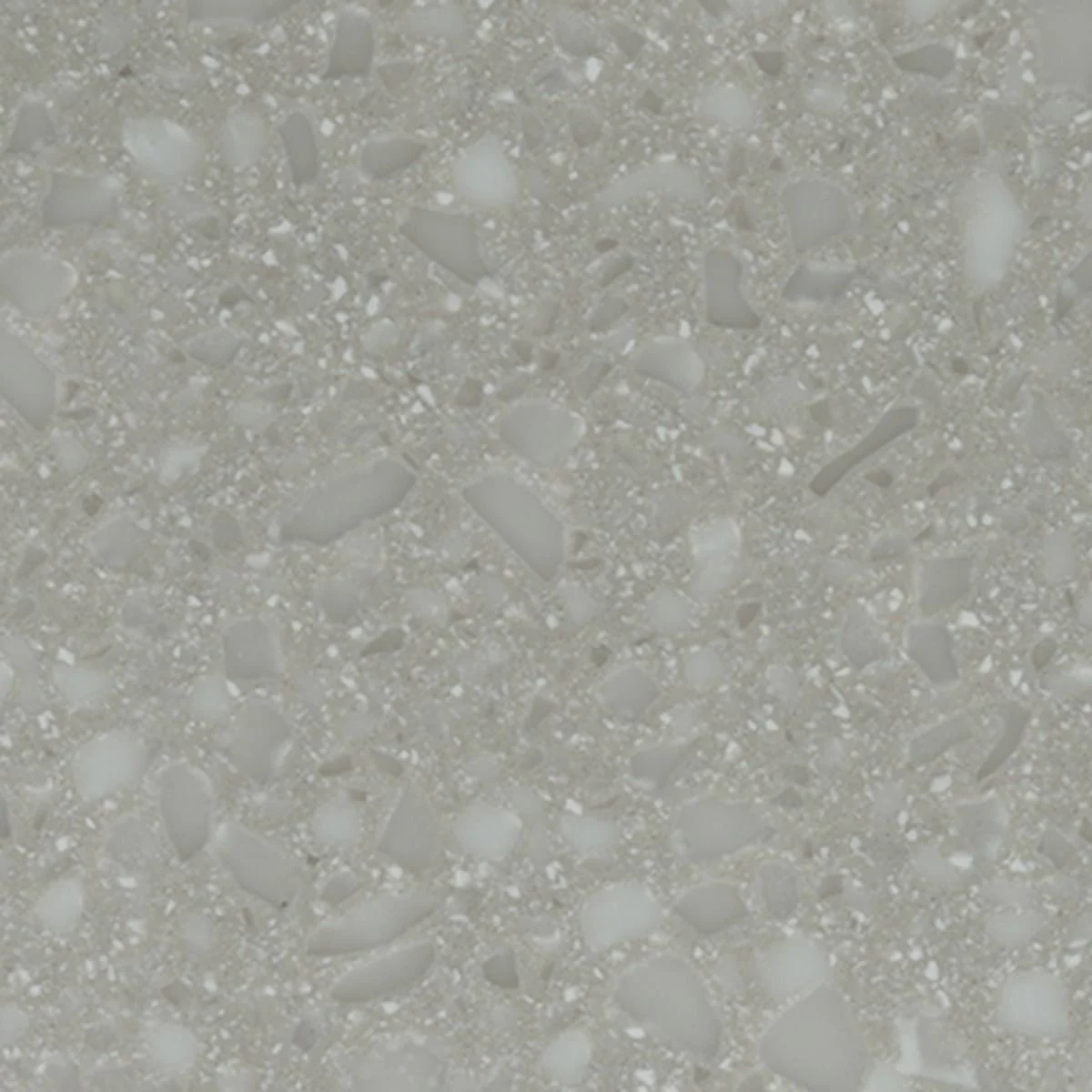 Close-up of a speckled, grayish-white Solid Surface.