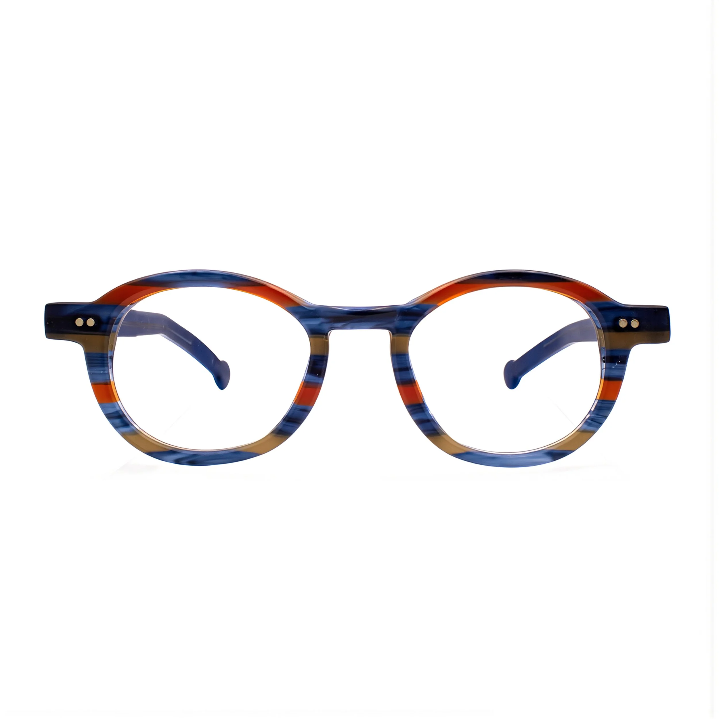 Partial view of a pair of sunglasses with a tortoiseshell pattern against a white background.