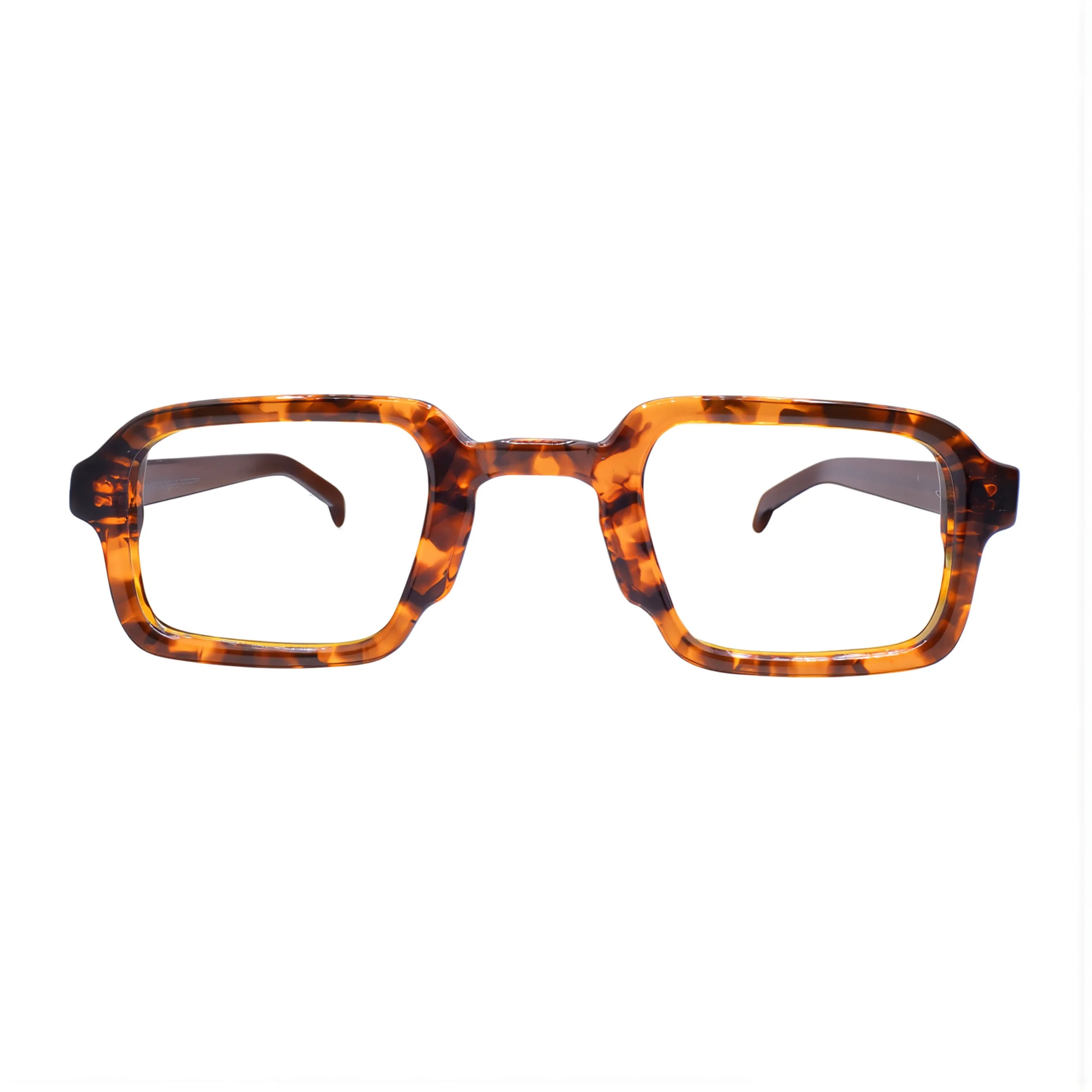 Close-up of tortoiseshell sunglasses with a white background.