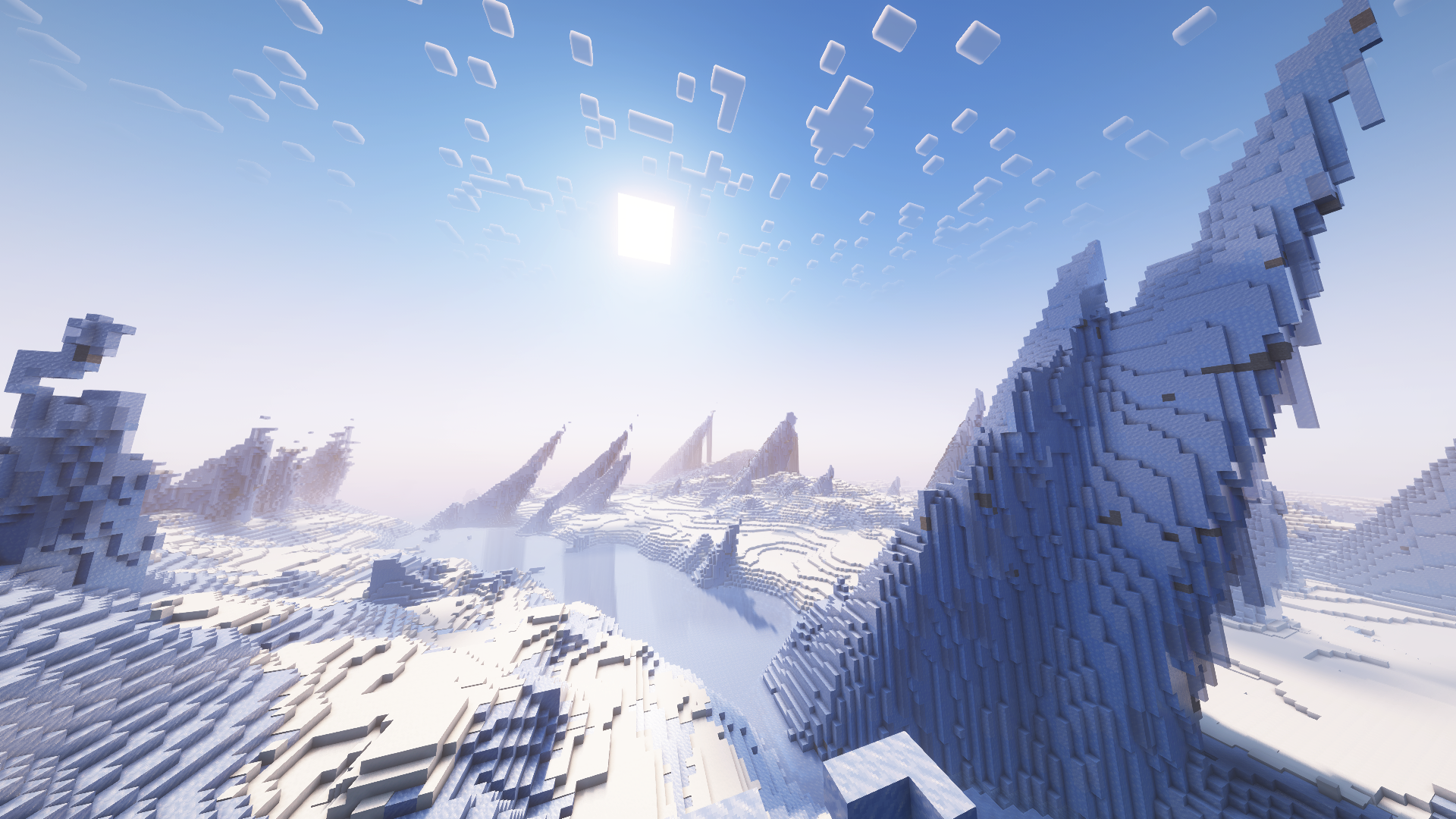 A snowy, mountainous landscape from the game Minecraft, featuring ice-covered peaks and a river in the distance under a bright sun in the sky.