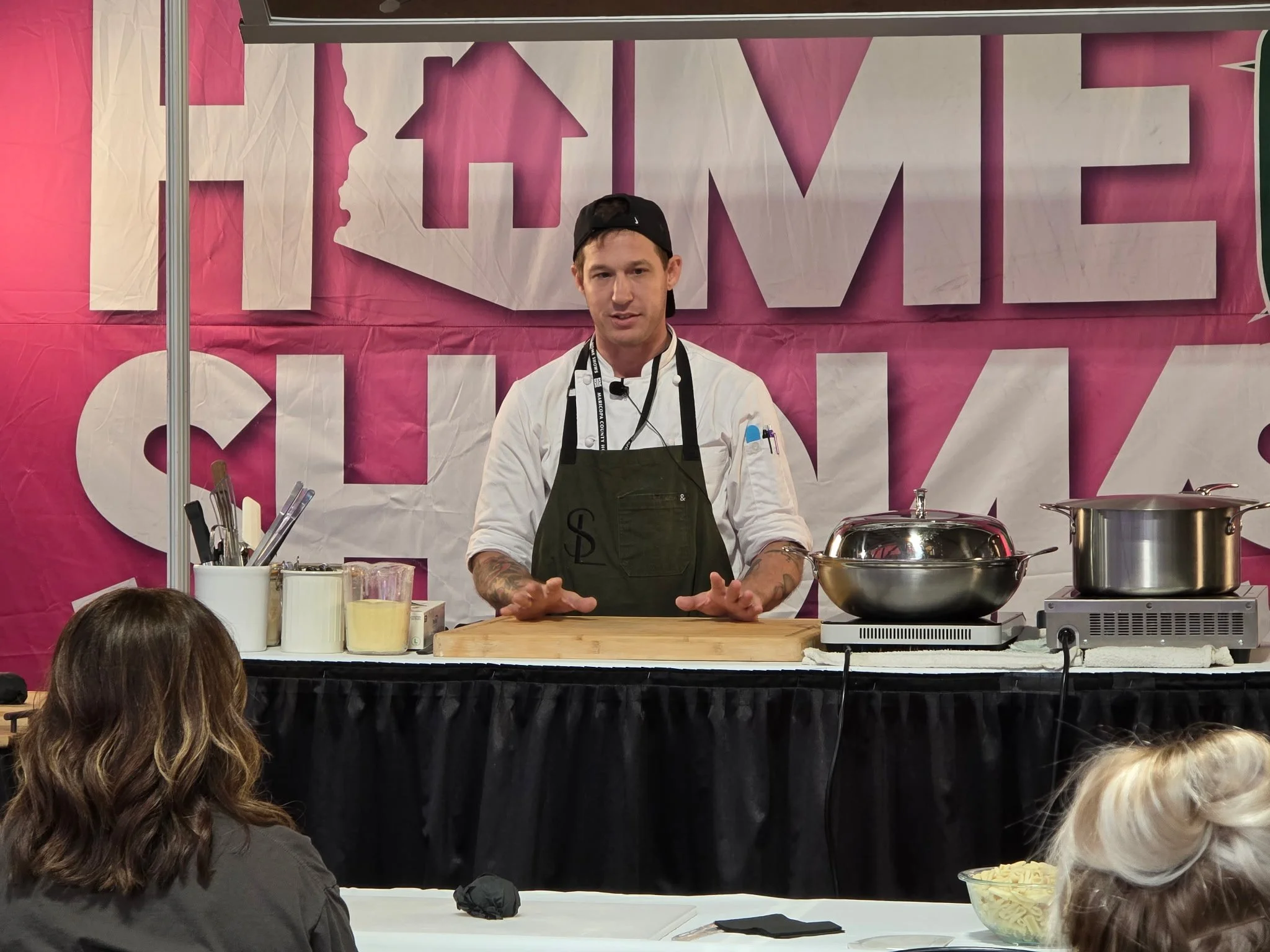 Chef Mitch Bell presenting a live cooking demo at a Home Shows event