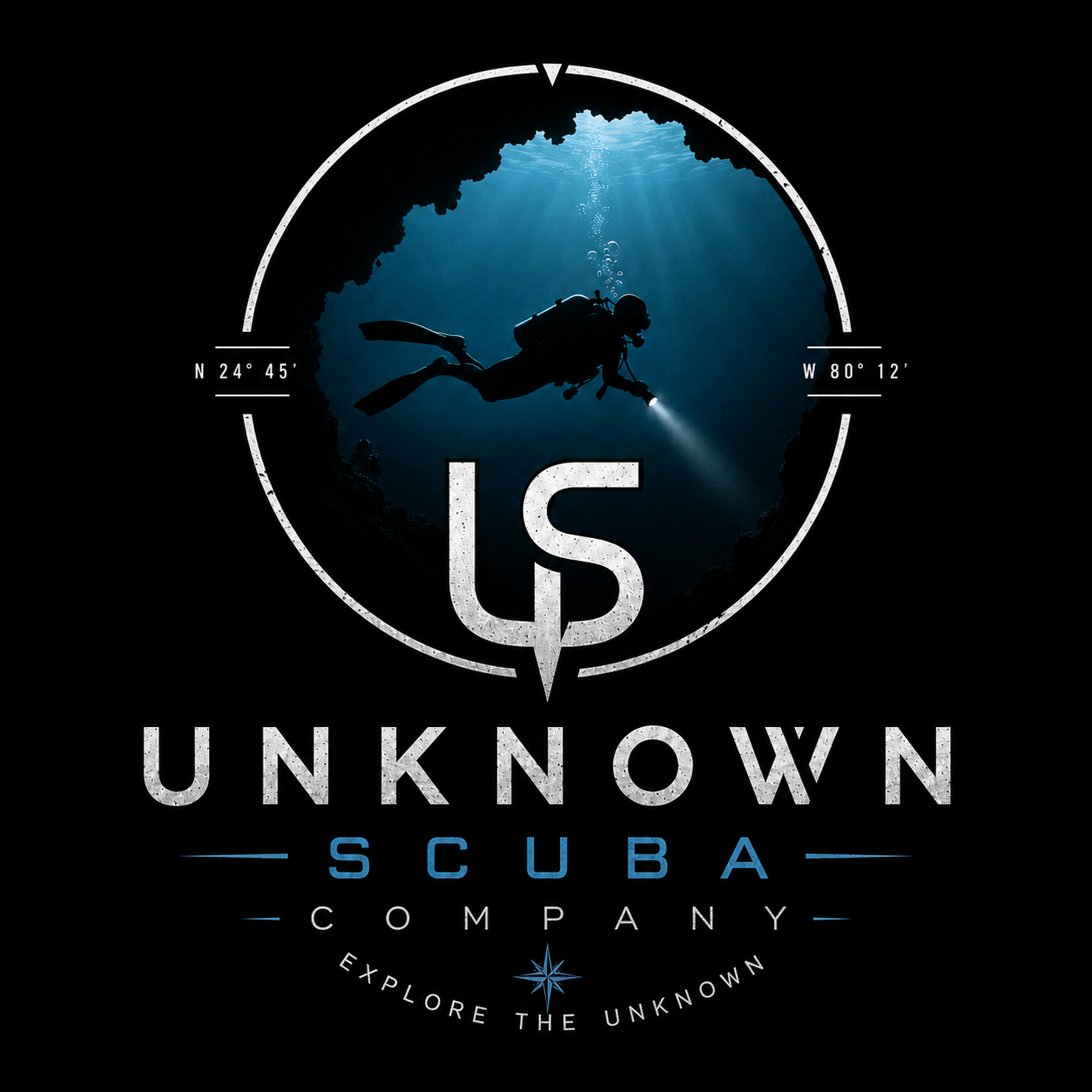 An underwater scene with a scuba diver exploring a cave, holding a flashlight. The scene is framed by a circular logo with the words "US UNKNOWN SCUBA COMPANY" and the tagline "Explore the Unknown."