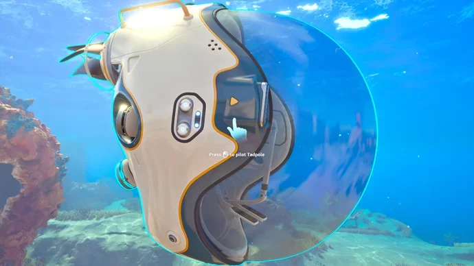 Il sottomarino Tadpole di Subnautica 2 pilotato dal giocatore su un fondale alieno colorato con flora bioluminescente