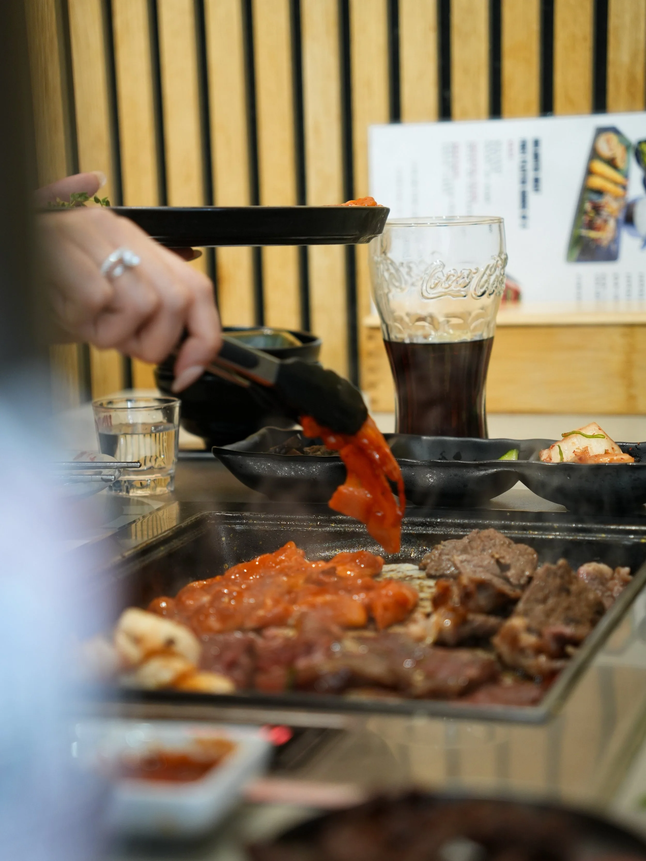 Your table. Your grill. Your experience. 🔥

Korean BBQ is more than just a meal &mdash; it&rsquo;s a moment to slow down, gather around the grill and enjoy food together.

Watch the meat hit the hot grill, listen to that satisfying sizzle, turn each