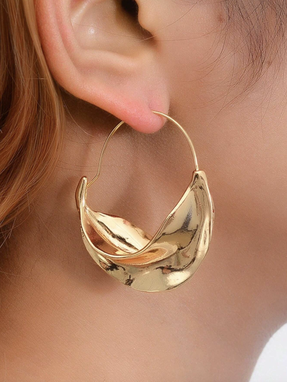2_sculptural gold hoops_pink works.png