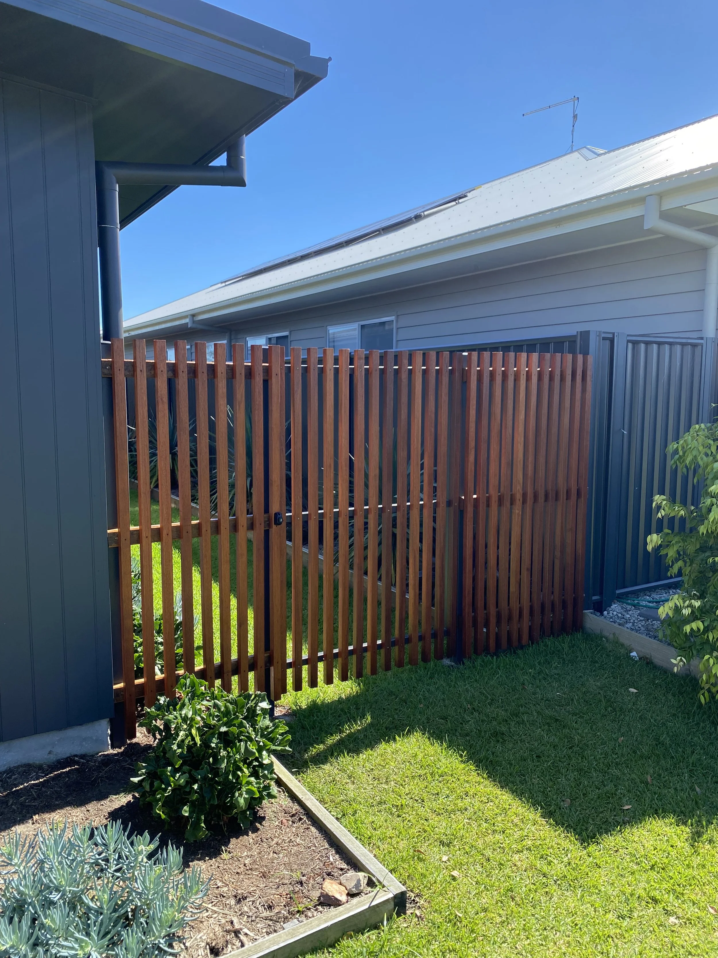 Side gate with 42x42 merbau battens on steel frame