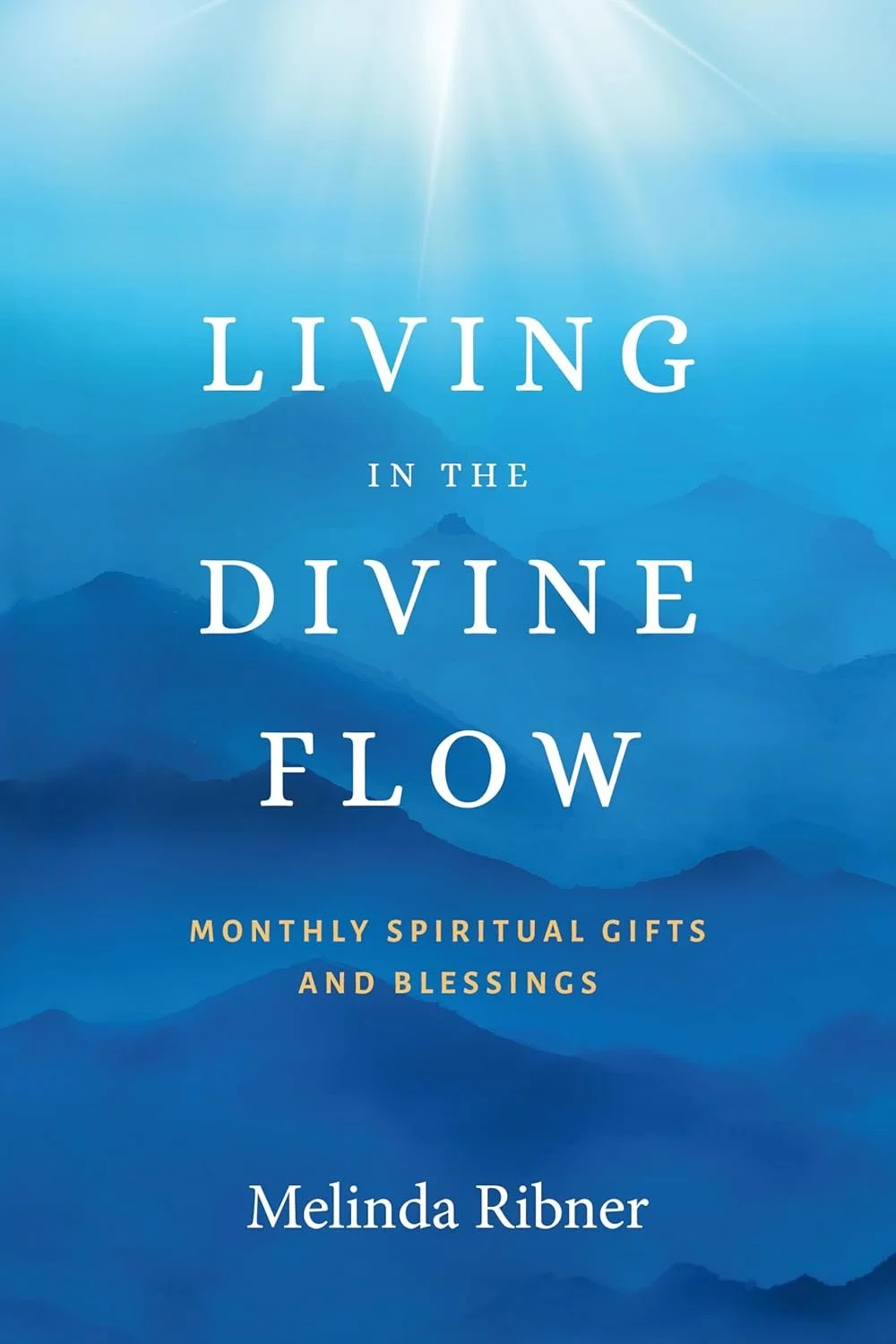 Book cover titled 'Living in the Divine Flow,' with a blue mountain landscape background and sunlight shining from above. Author is Melinda Ribner.