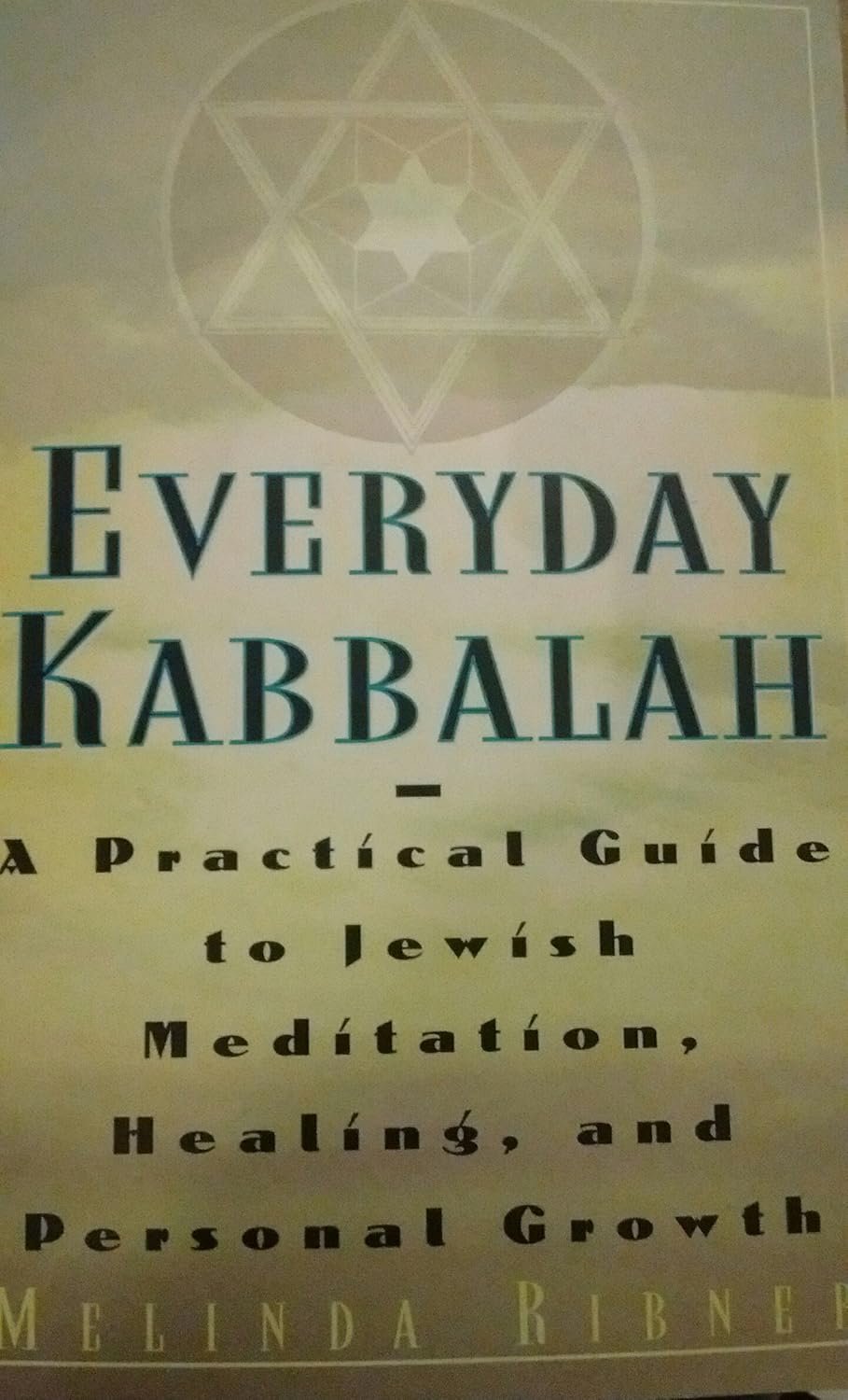 Book cover titled "Everyday Kabbalah: A Practical Guide to Jewish Meditation, Healing, and Personal Growth" by Melinda Ribner, featuring a geometric symbol at the top.