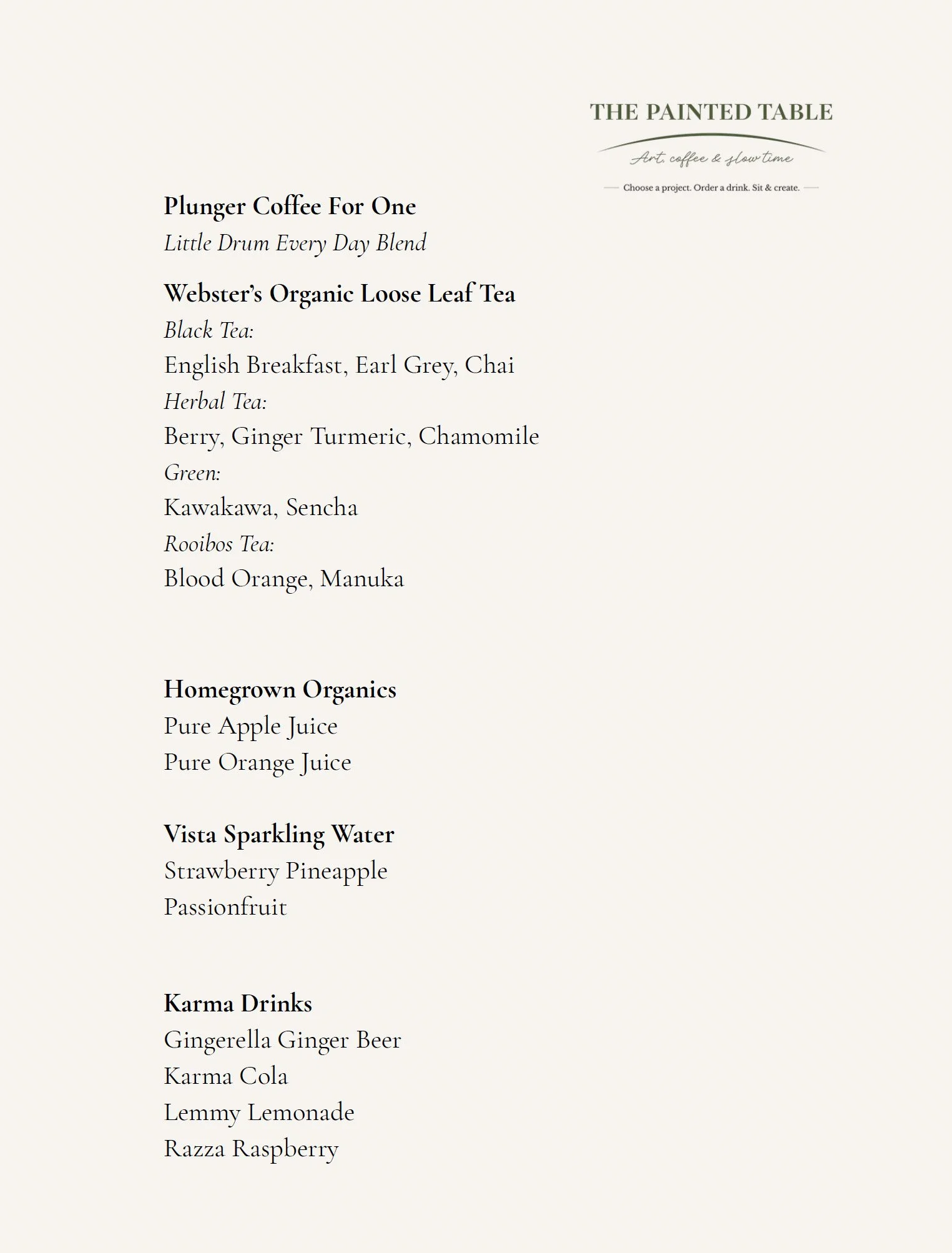 A menu with various beverage options, including coffee, tea, sparkling water, and karma drinks, printed in black text on a white background.