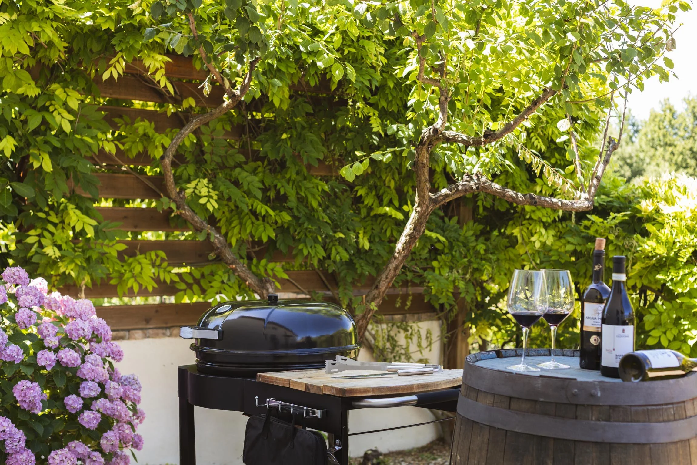 A shaded BBQ area amongst the flowers for the home chef.