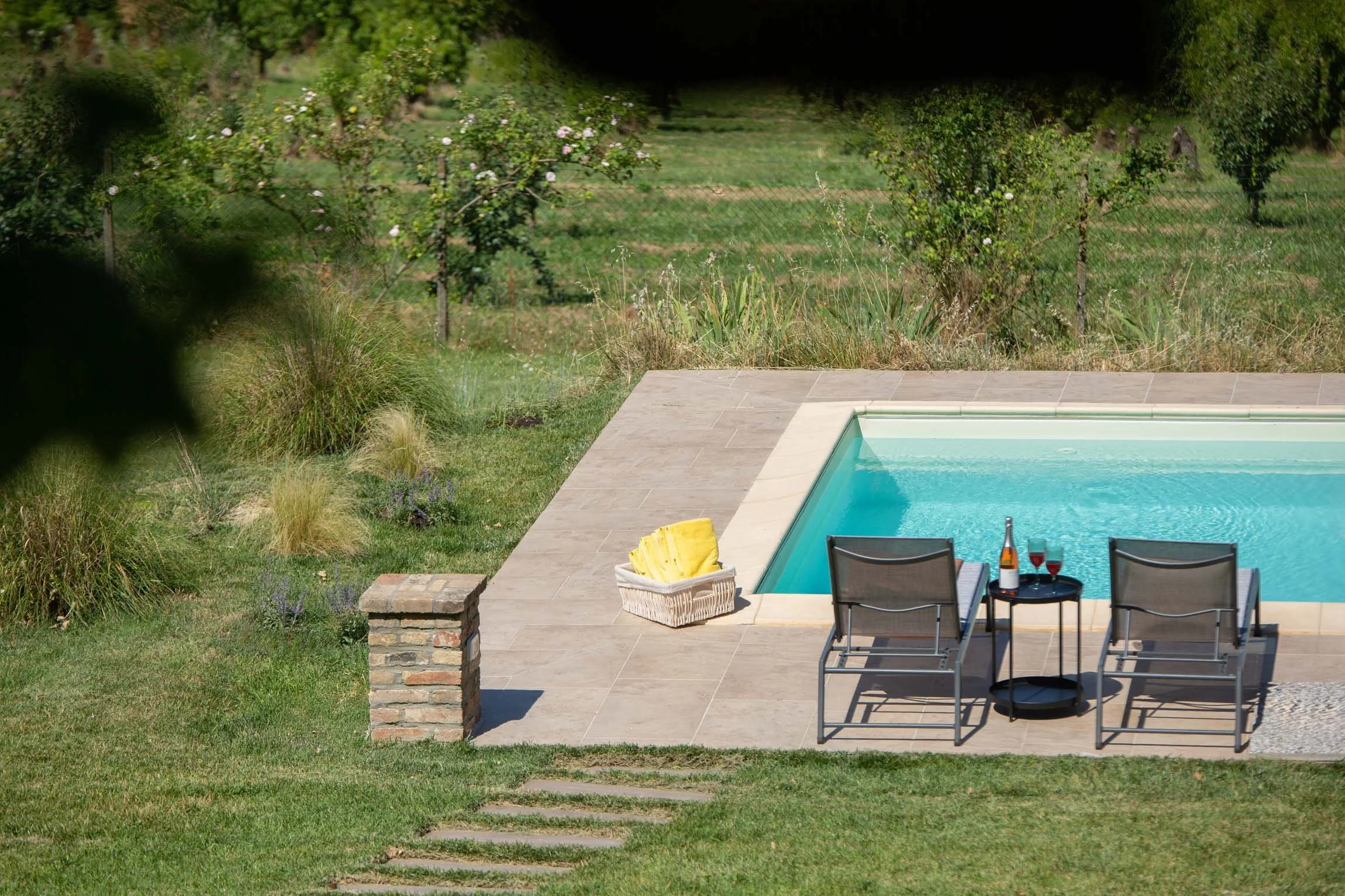 Pool glimpses from the shaded pergola