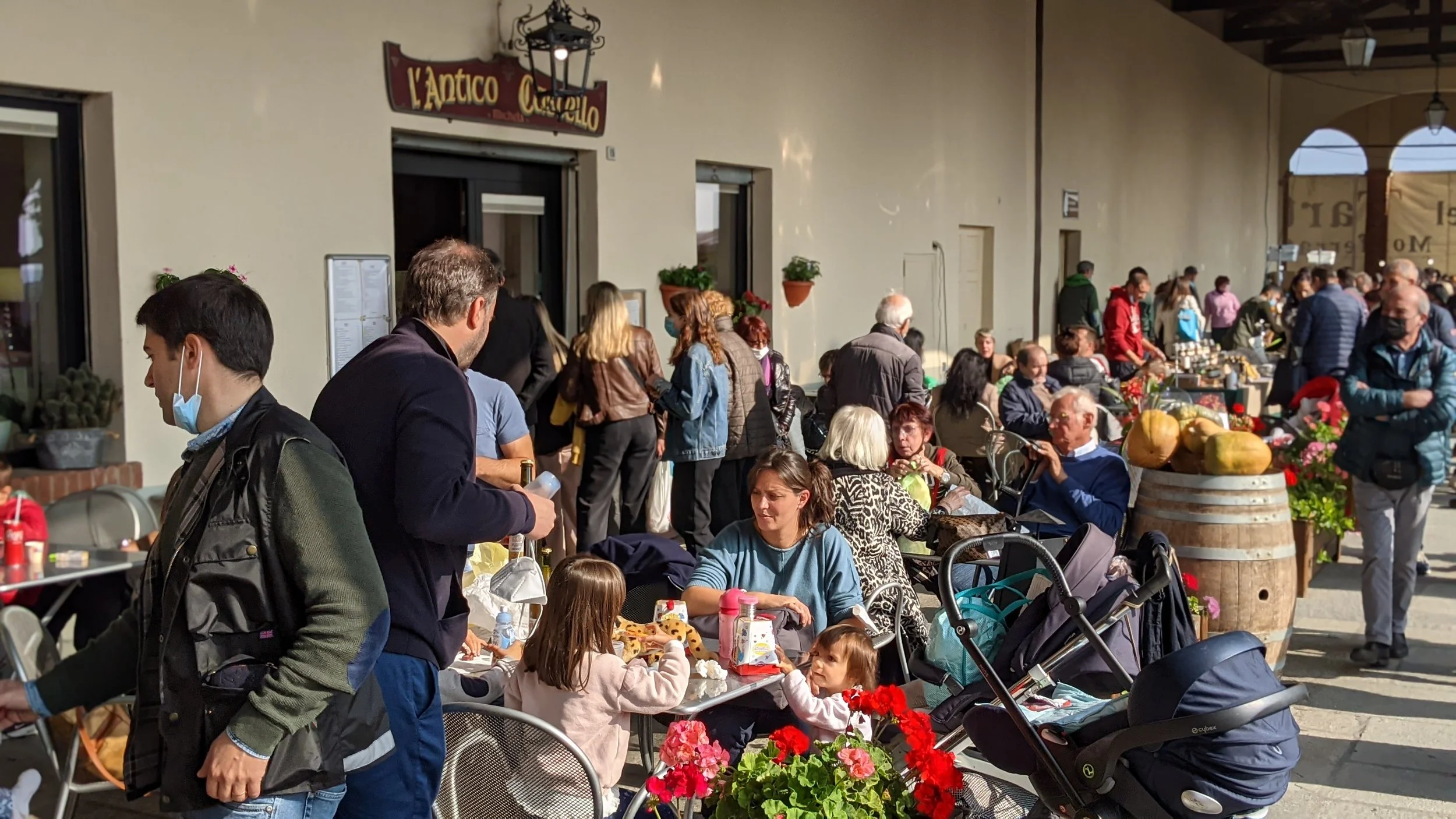 Local Italians and tourists mingle at a local Osteria fro a break from the fair for the all important pausa pranzo