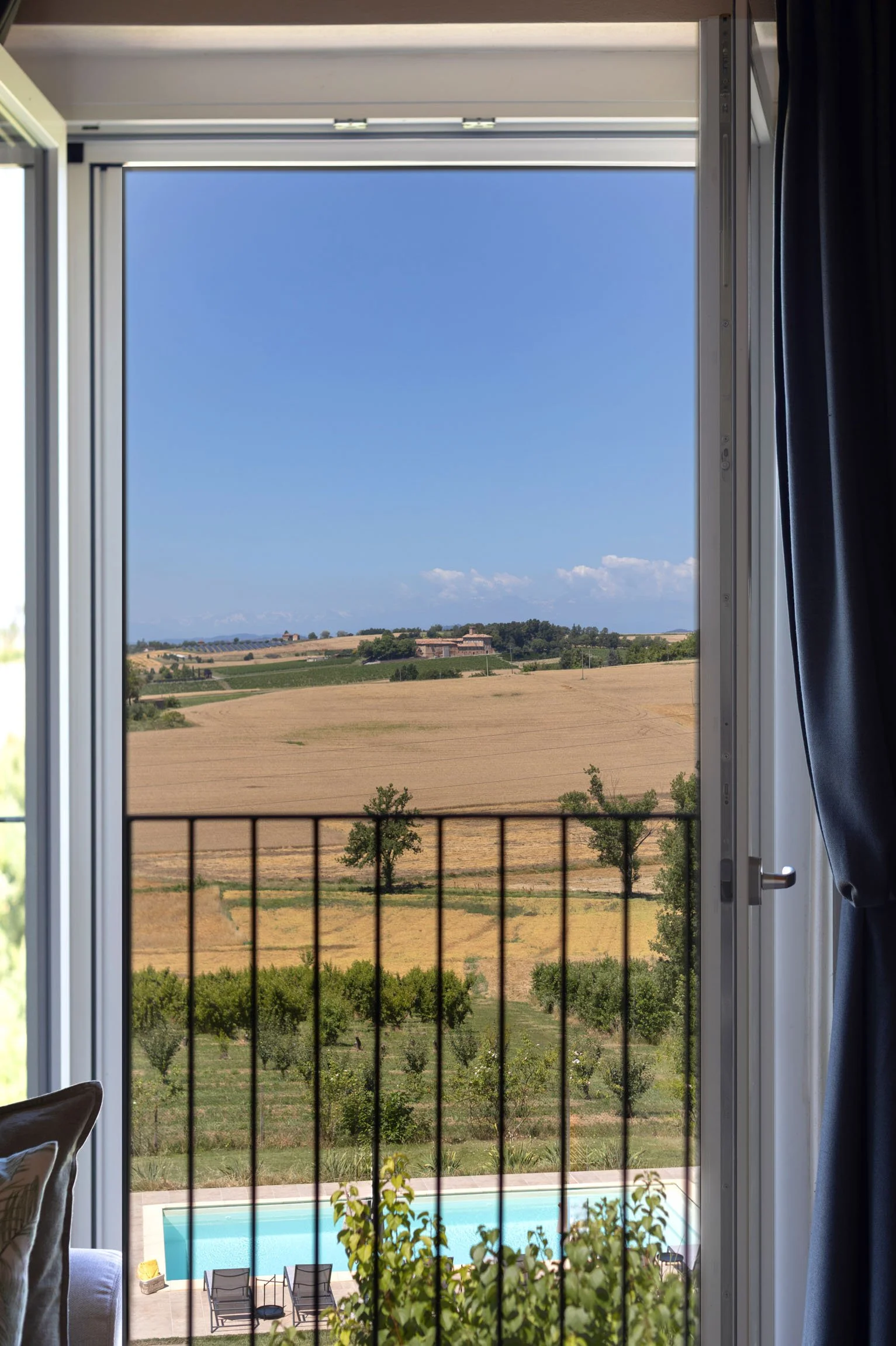 Breathtaking views of Monferrato vineyards from the main en suite bedroom.
