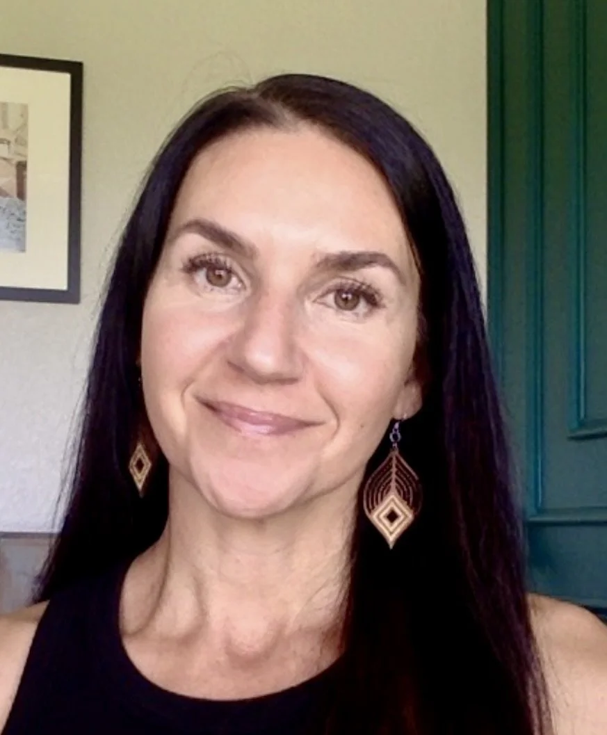 Professional headshot of Marisa Giuliano, licensed therapist providing online therapy in Tennessee and Florida.