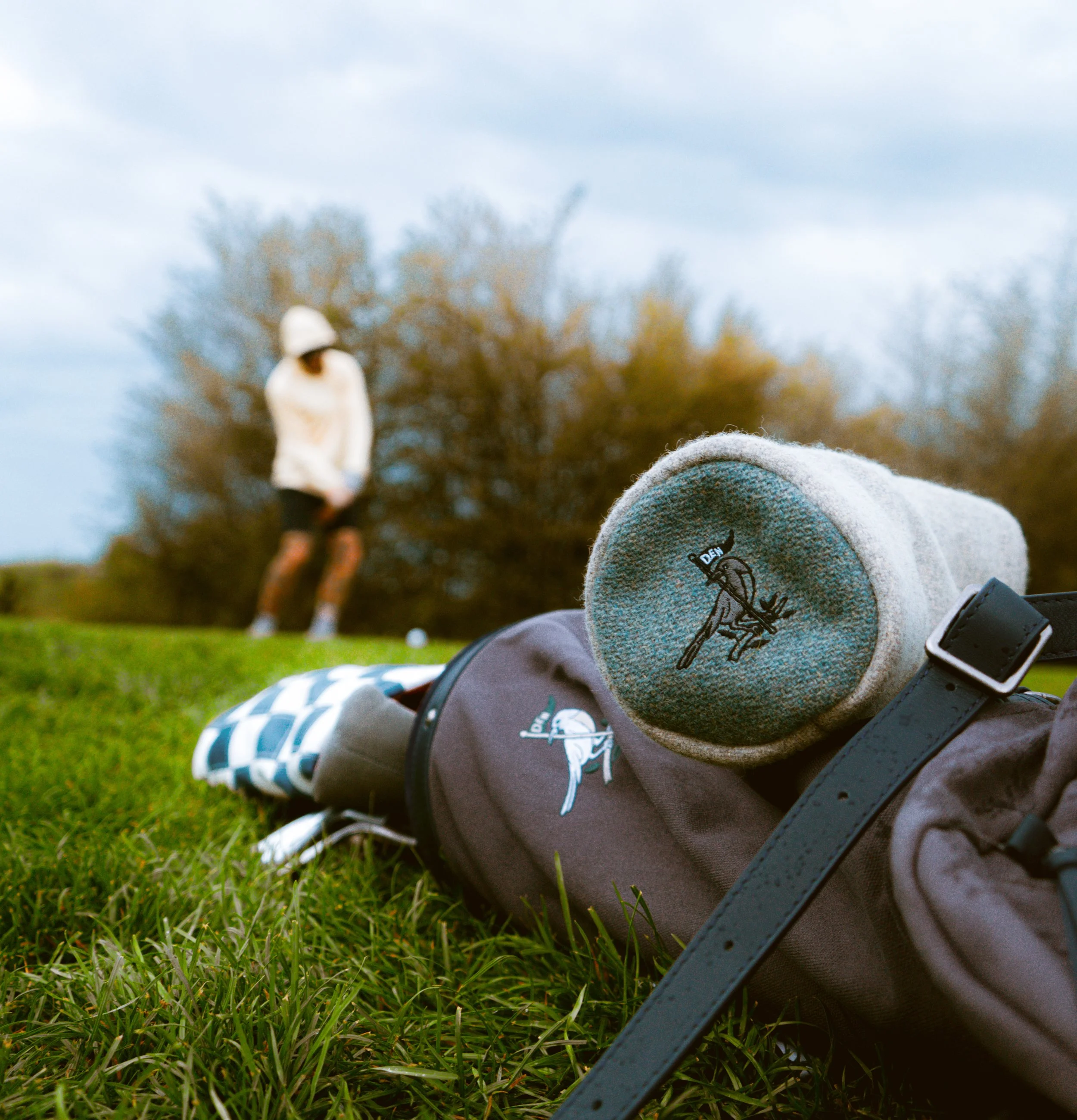 Close-up of a carry bag and custom handmade headcover.