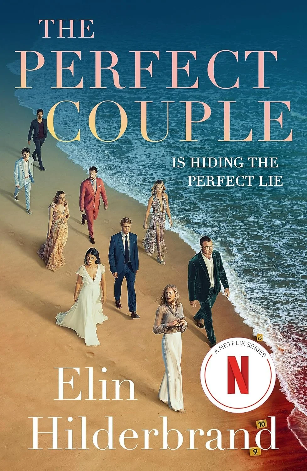 Cover art for the Netflix series 'The Perfect Couple' featuring a group of people walking along the beach at sunset, dressed in elegant attire.
