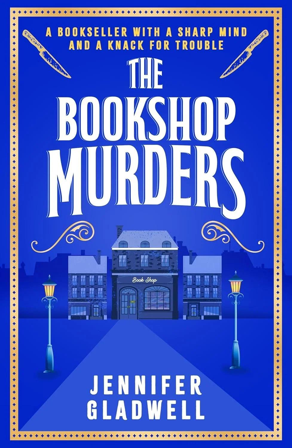 Book cover for "The Bookshop Murders" by Jennifer Gladwell, featuring a blue background, illustration of a bookshop with street lamps, and gold decorative elements.