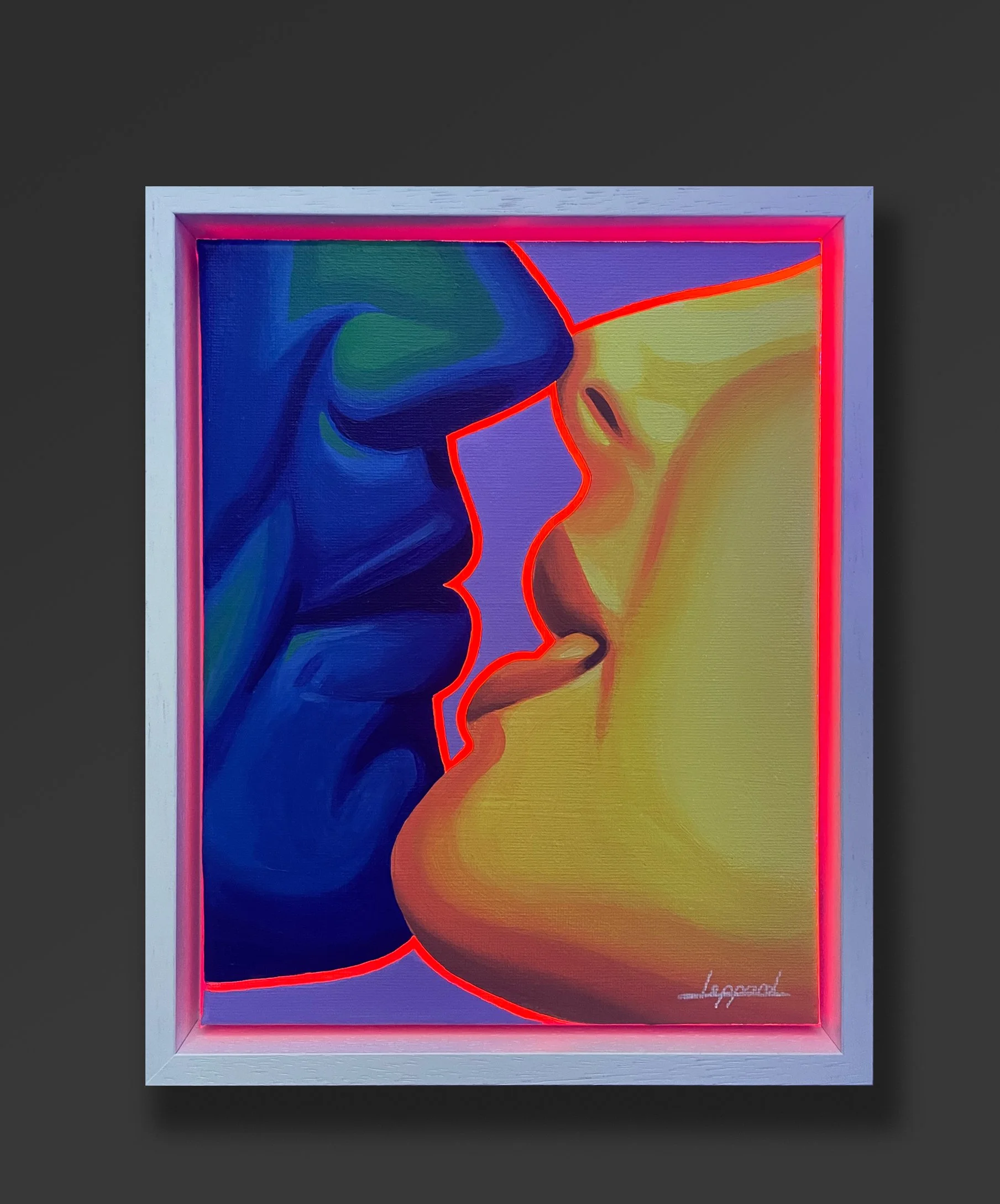 A framed  artwork showing two stylized, colorful faces in profile, outlined in neon red and touching noses, with a purple background.