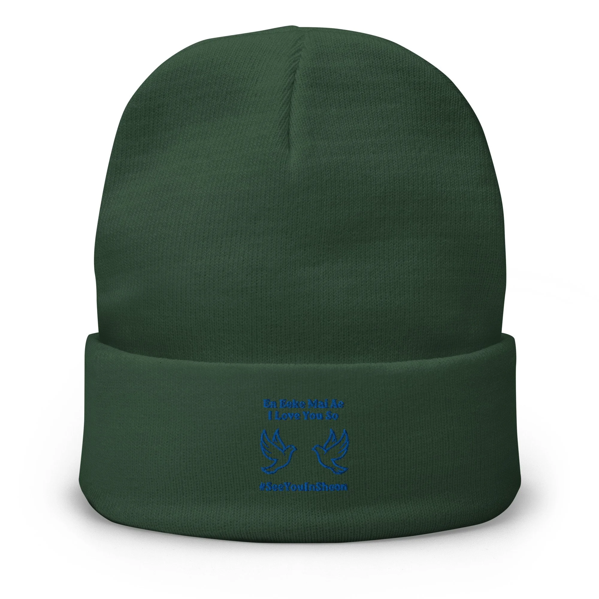 Close-up of a dark green beanie with blue embroidered text and design, mentioning En Lake Mat A, I Love You So, and #IceYouInShon.