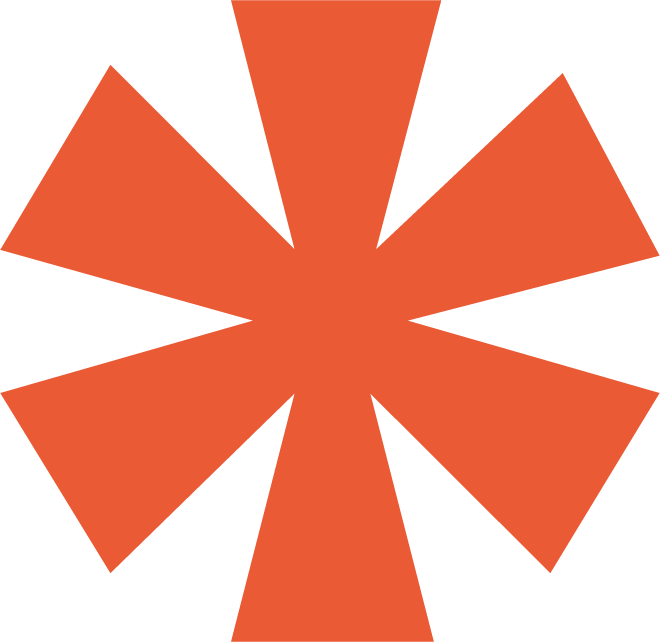 A starburst pattern with eight orange trapezoids radiating from a center point, creating a symmetrical design.