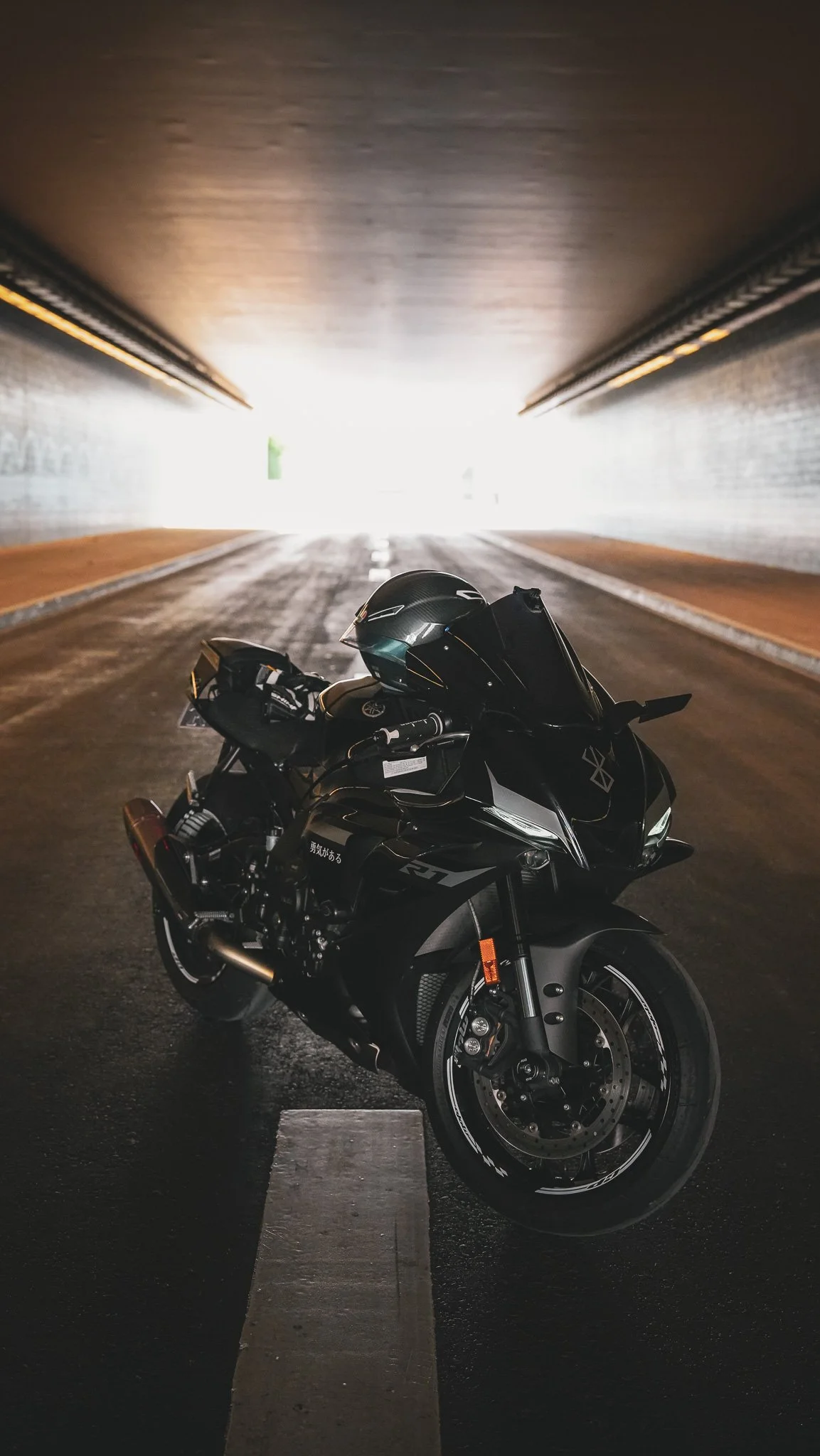 The Yamaha YZF-R1 parked in a tunnel to bask in the aura at the end.