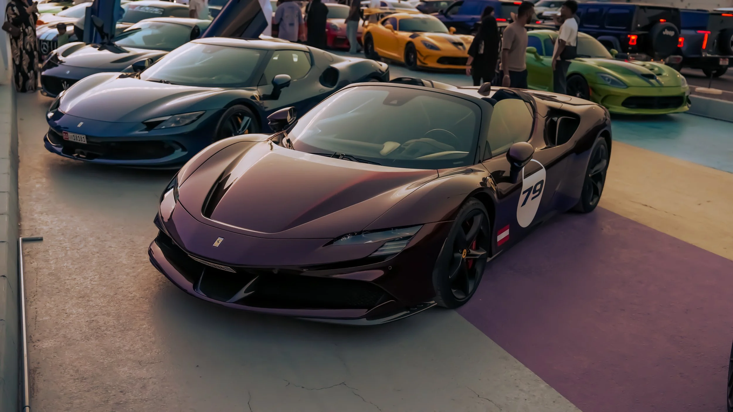 A Ferrari SF90 on display at a car meet in Al Qana