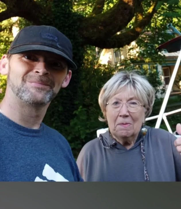 The Owner and one of his clients with a look of satisfaction on her face.