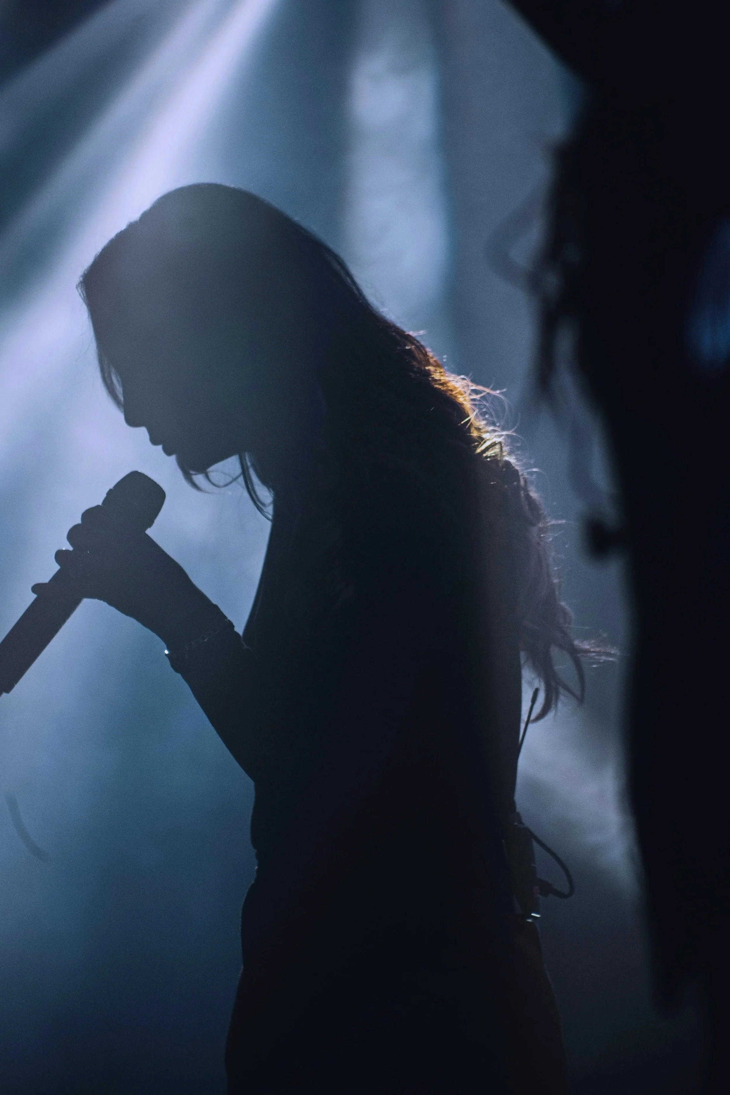 Singer performing live on stage — The Vocal Practice, voice coaching for contemporary artists in NYC