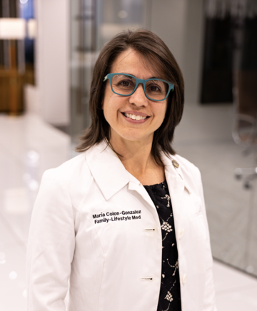 Dr. María Colón-González, MD, board-certified family physician and founder of Salud Revisited