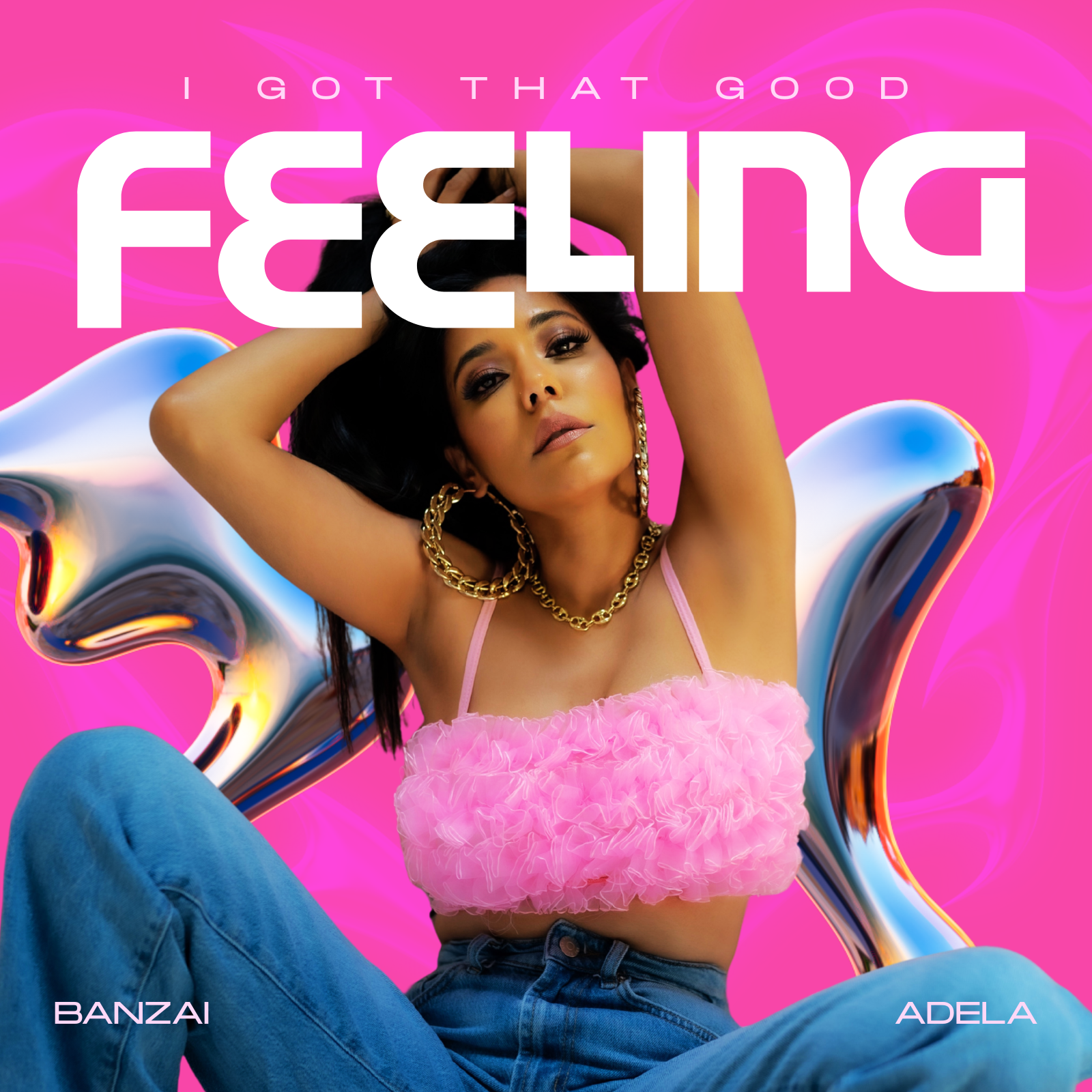 A woman with dark hair and makeup wearing a pink ruffled top and gold jewelry, sitting against an abstract metallic background with a pink backdrop, with the text "I GOT THAT GOOD FEELING" and the names "BANZAI" and "ADELA" at the bottom.
