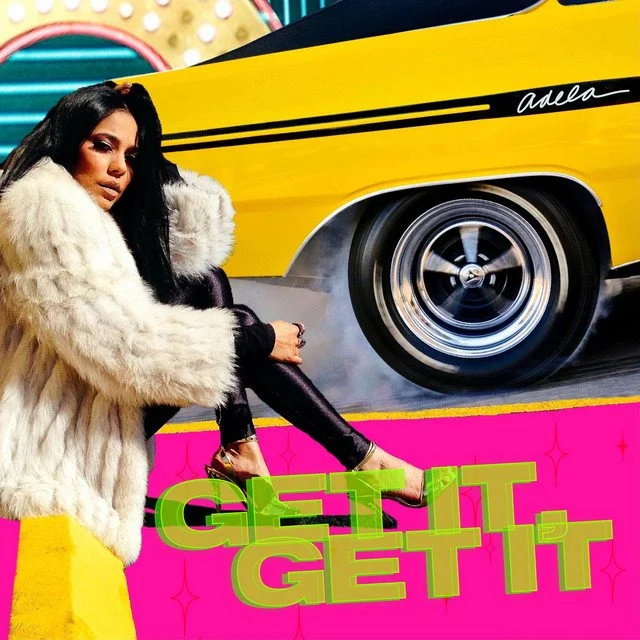 A woman in a white fur coat and black leather pants posing next to a yellow vintage car with black stripe details in front of a colorful background and bright pink text that says 'GET IT, GET IT'.