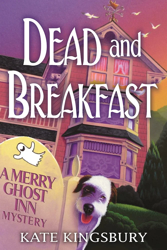 Book cover for 'Dead and Breakfast' by Kate Kingsbury, featuring a haunted house, a ghostly bird, and a dog with a happy expression.