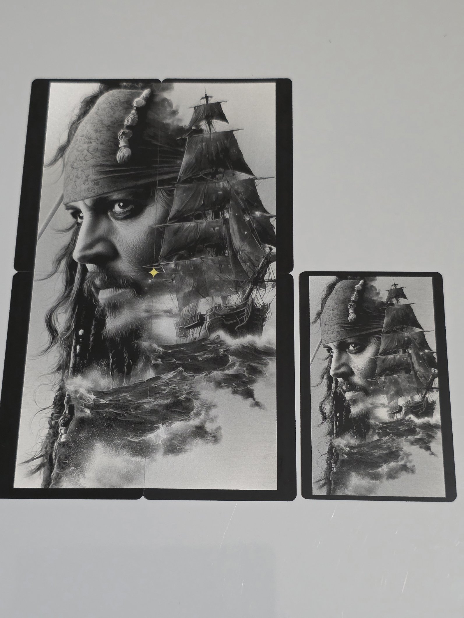 Black and white illustration of a pirate with a beard and bandana, with a sailing ship on stormy seas behind him.