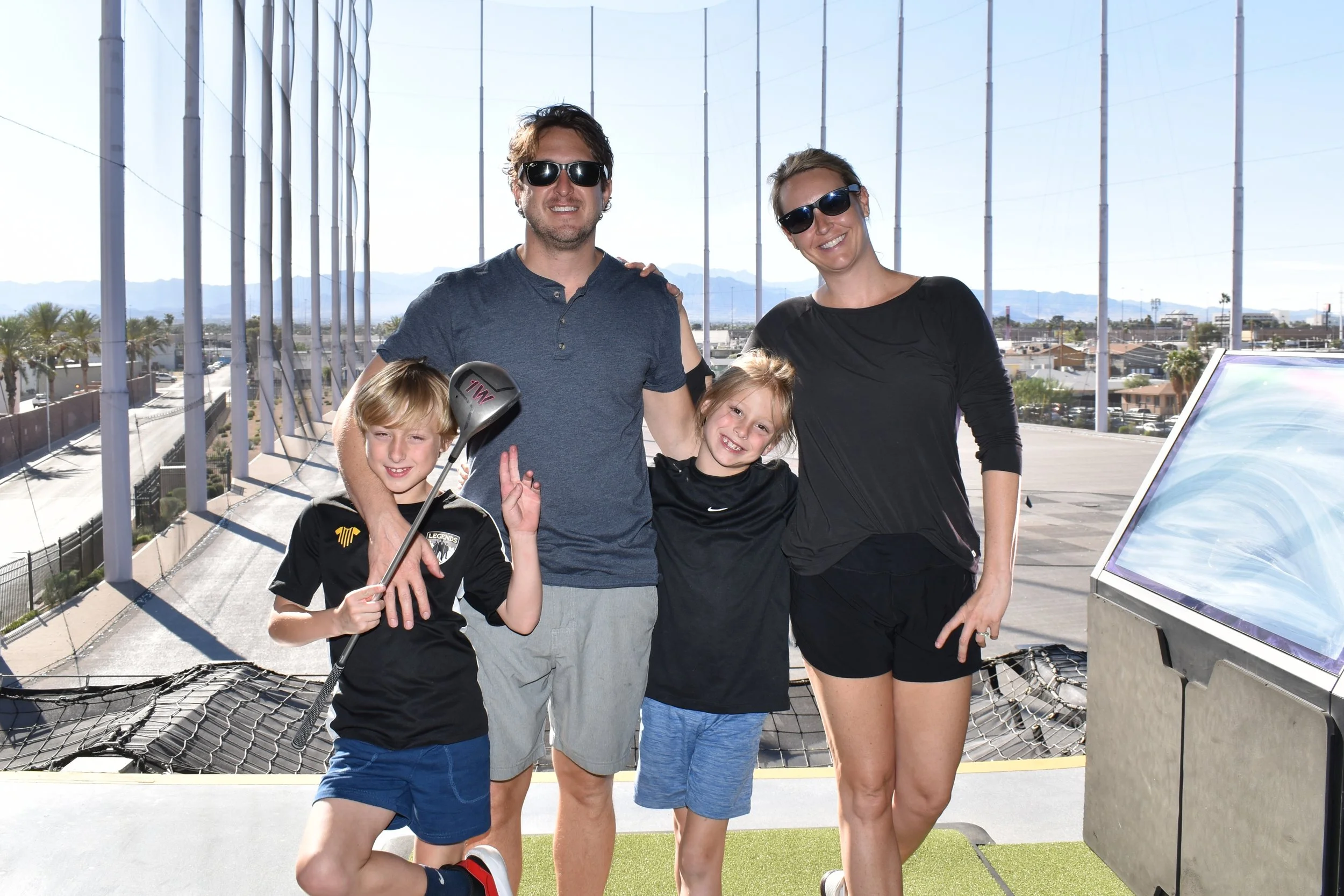 Erin, Co-Founder of Tidy, with her husband and twin boys at a family outing.