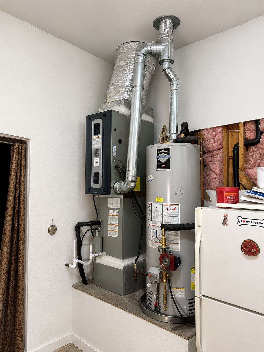 Residential utility room with furnace and HVAC equipment installation