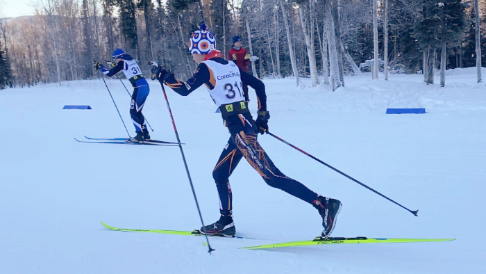 A picture of Rob Herrick's son competing in a cross country ski race.