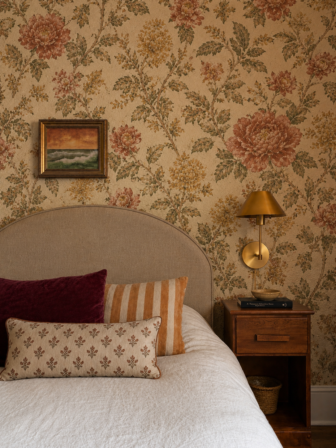 vintage bedroom, layered, collected, antique, upholstered headboard, brass sconce, vintage art, linen