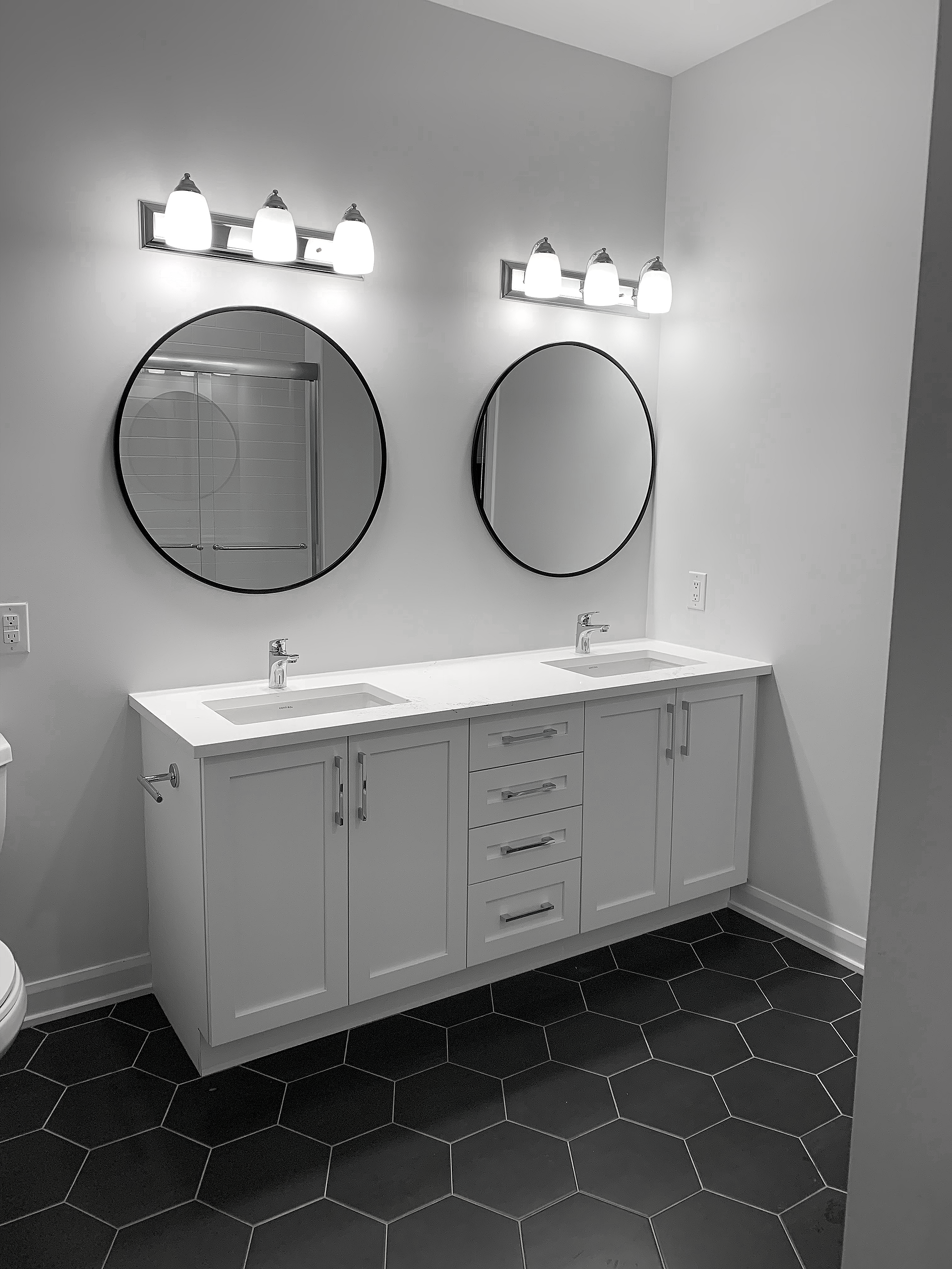 Mirrors and Light Fixtures are polished.