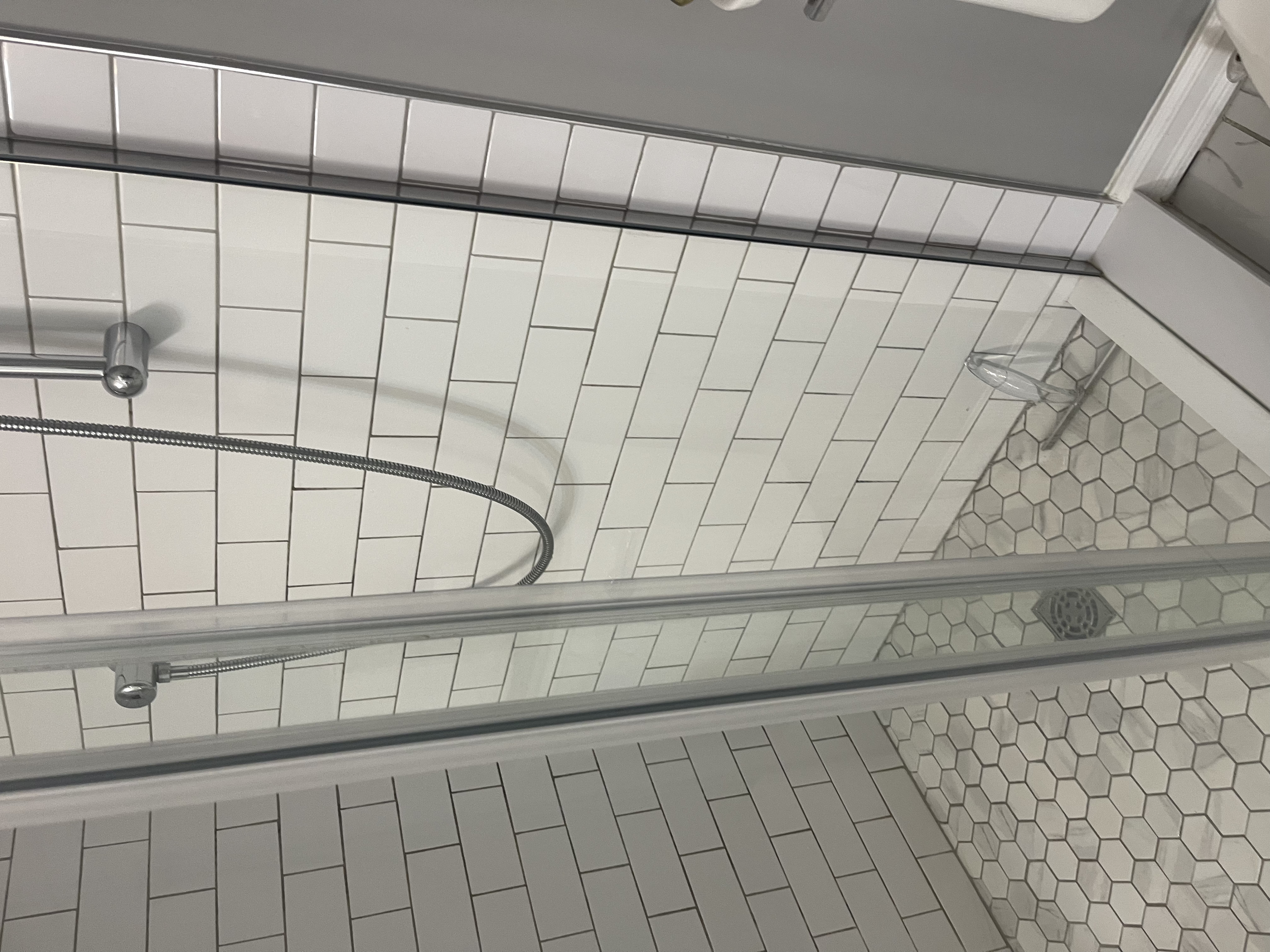 After using a few different products along with some serious scubbing we were able to bring this shower enclosure back to its high polished original state.