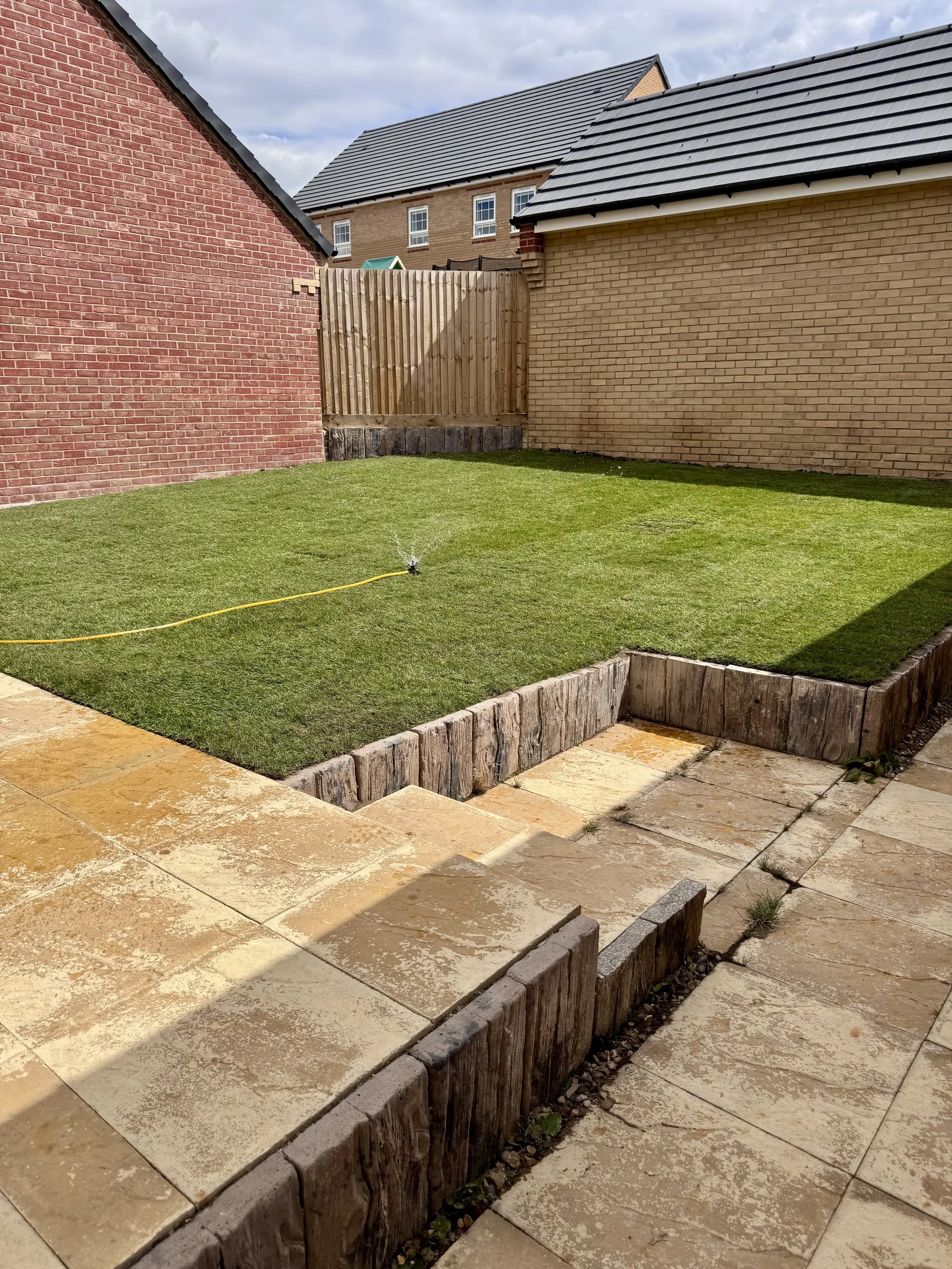 Fresh turf and landscaping in a garden